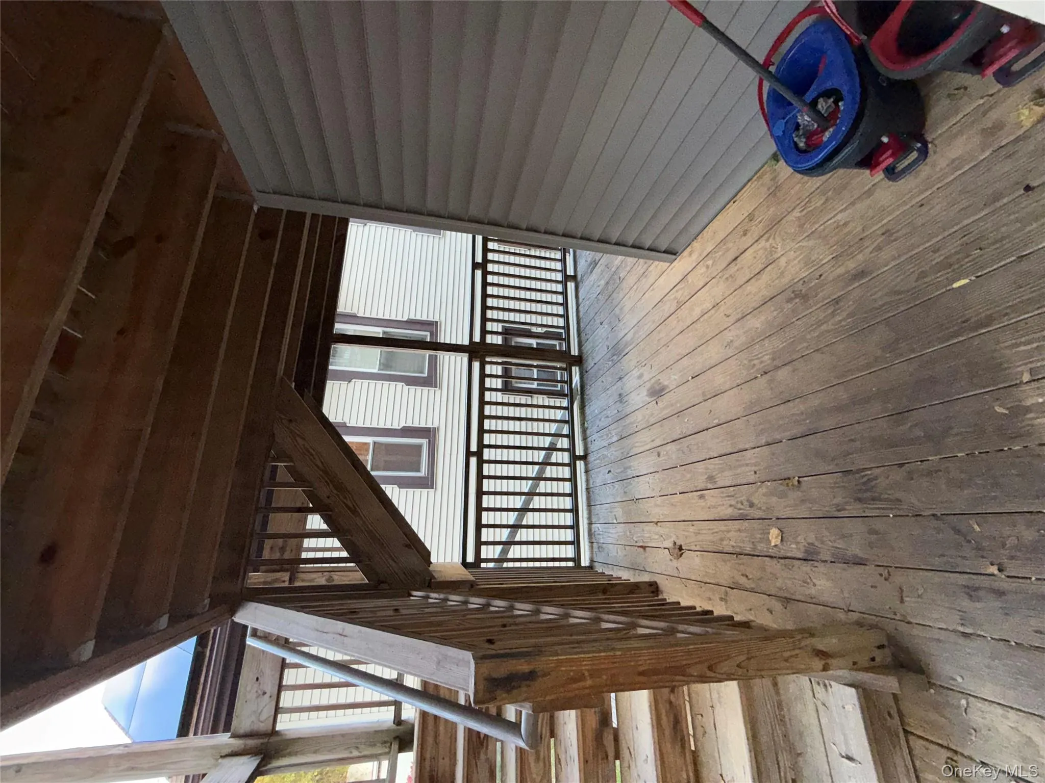 Deck featuring stairway Deck featuring stairway