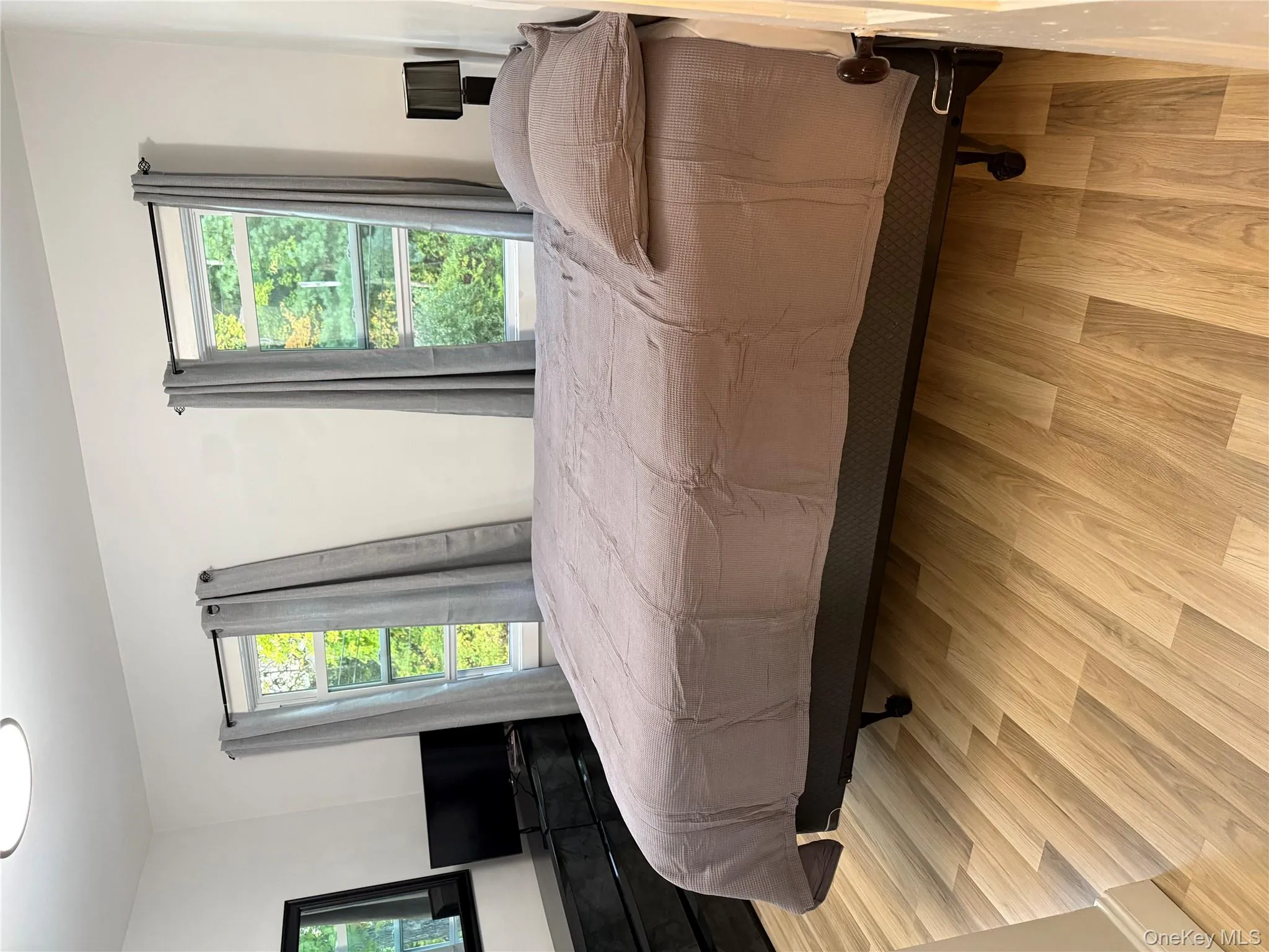 Bedroom featuring light wood-type flooring Bedroom featuring light wood-type flooring