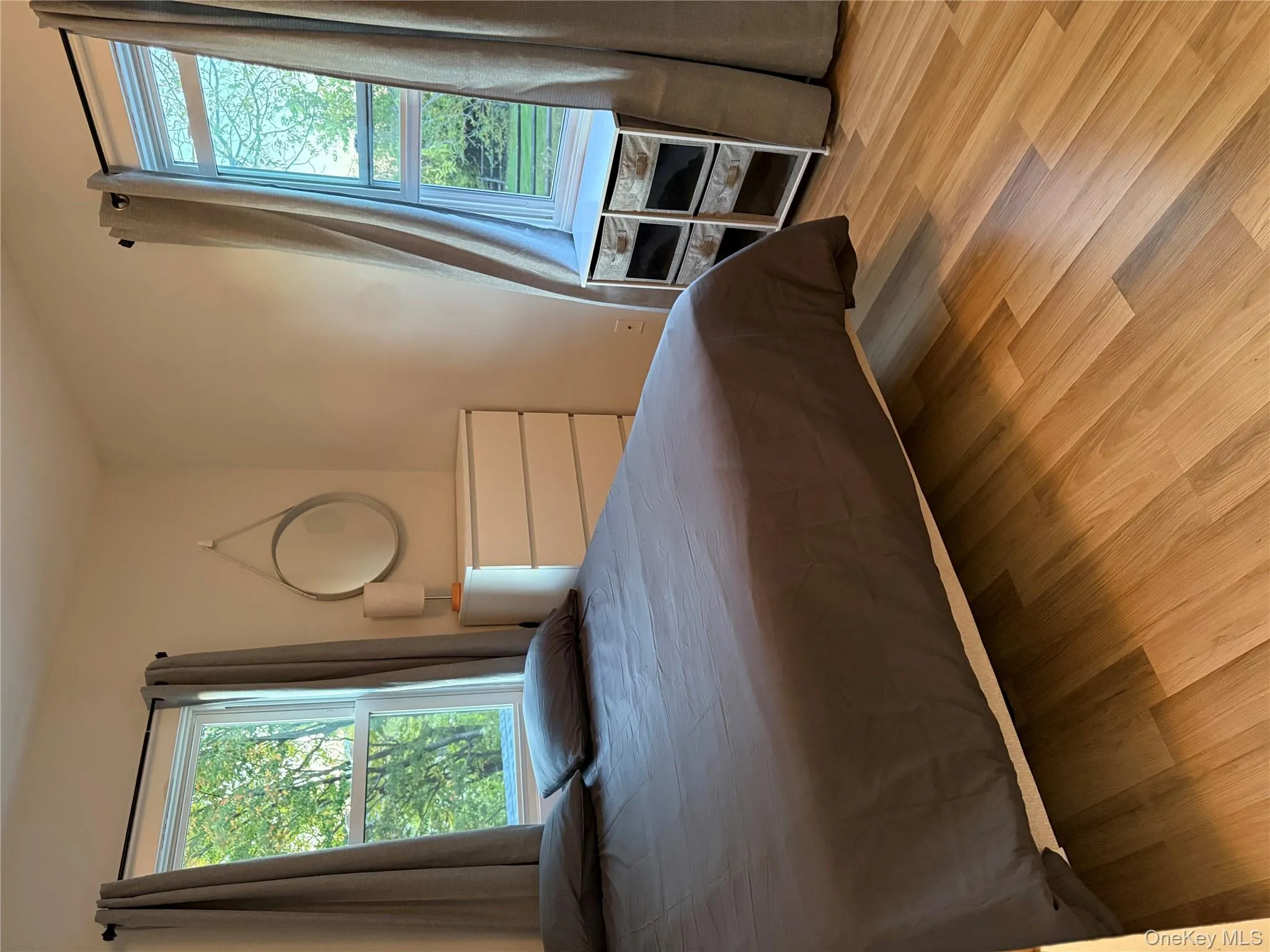 Bedroom with wood finished floors Bedroom with wood finished floors