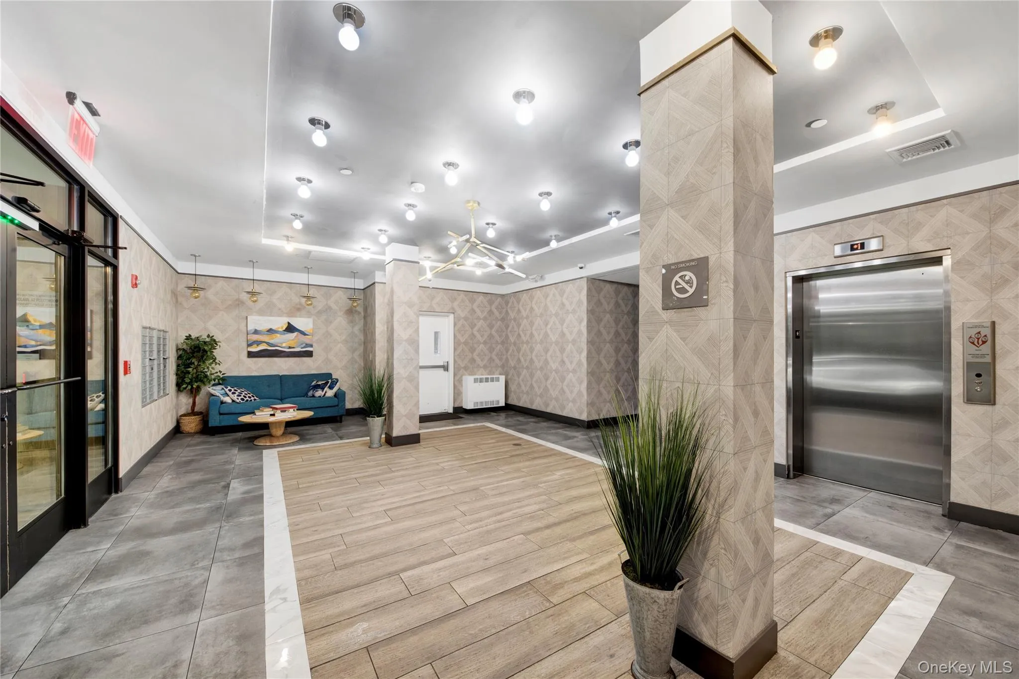 Community lobby with wallpapered walls Community lobby with wallpapered walls