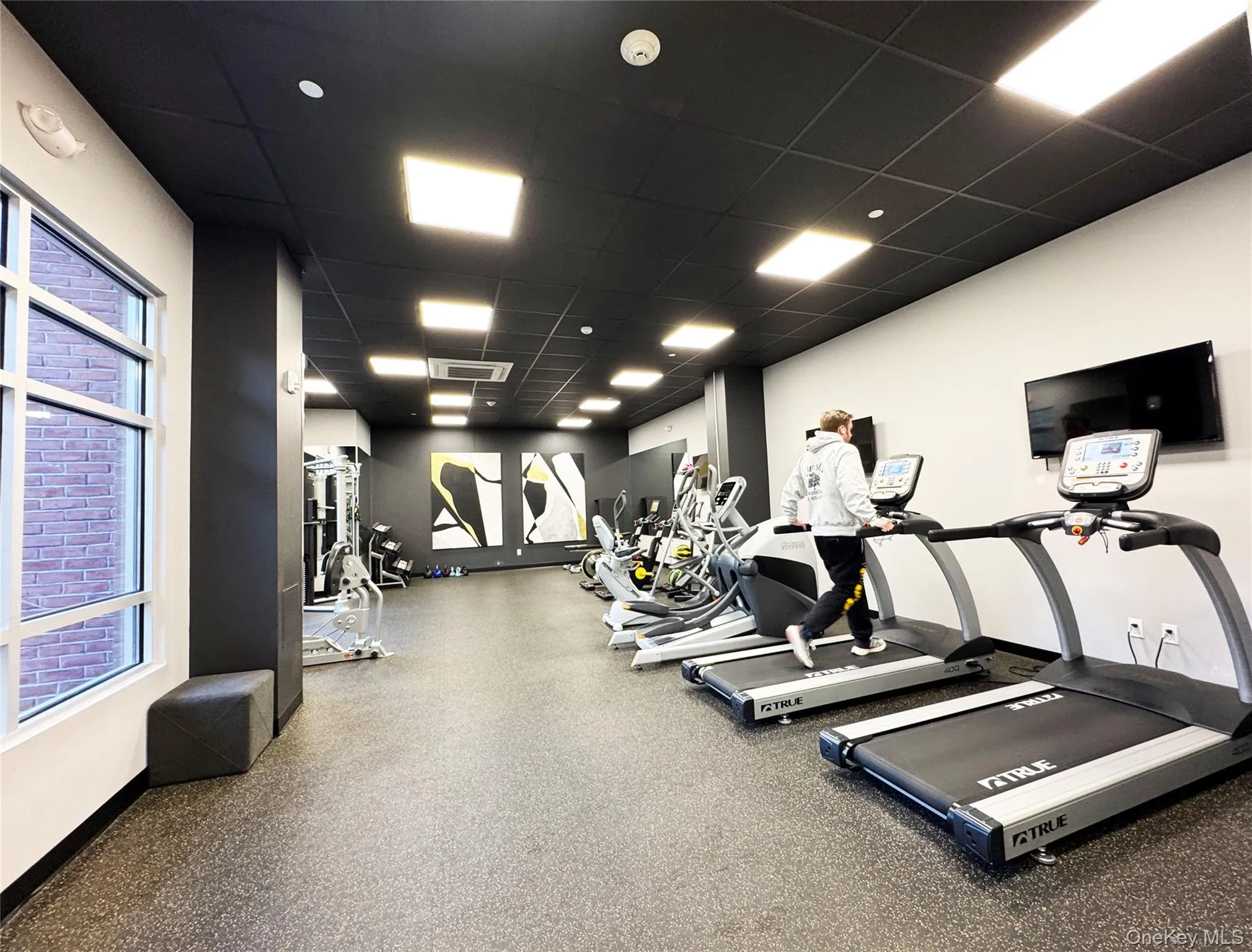 Gym with a paneled ceiling Gym with a paneled ceiling