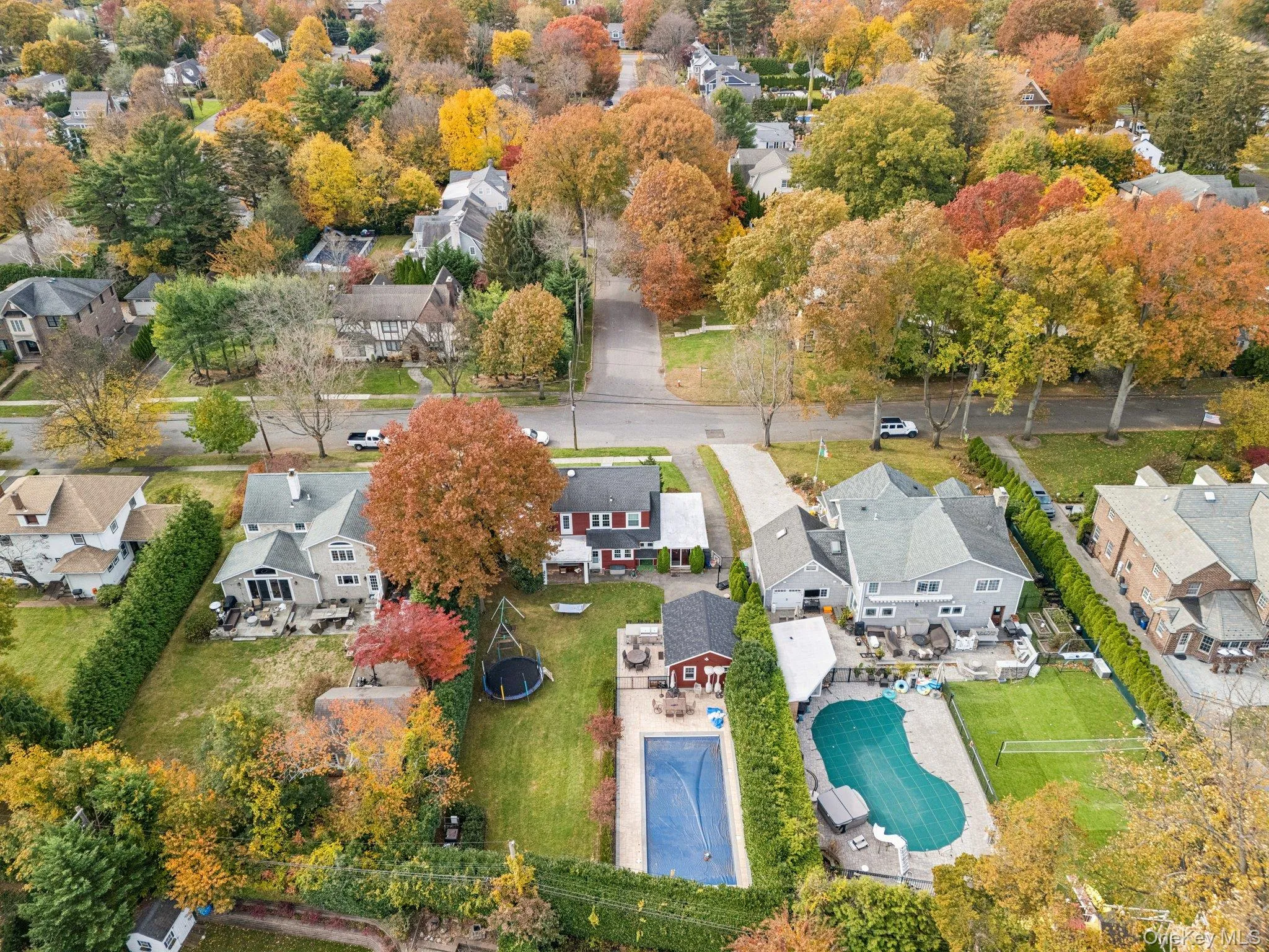 Aerial overview of property's location with nearby suburban area Aerial overview of property's location with nearby suburban area