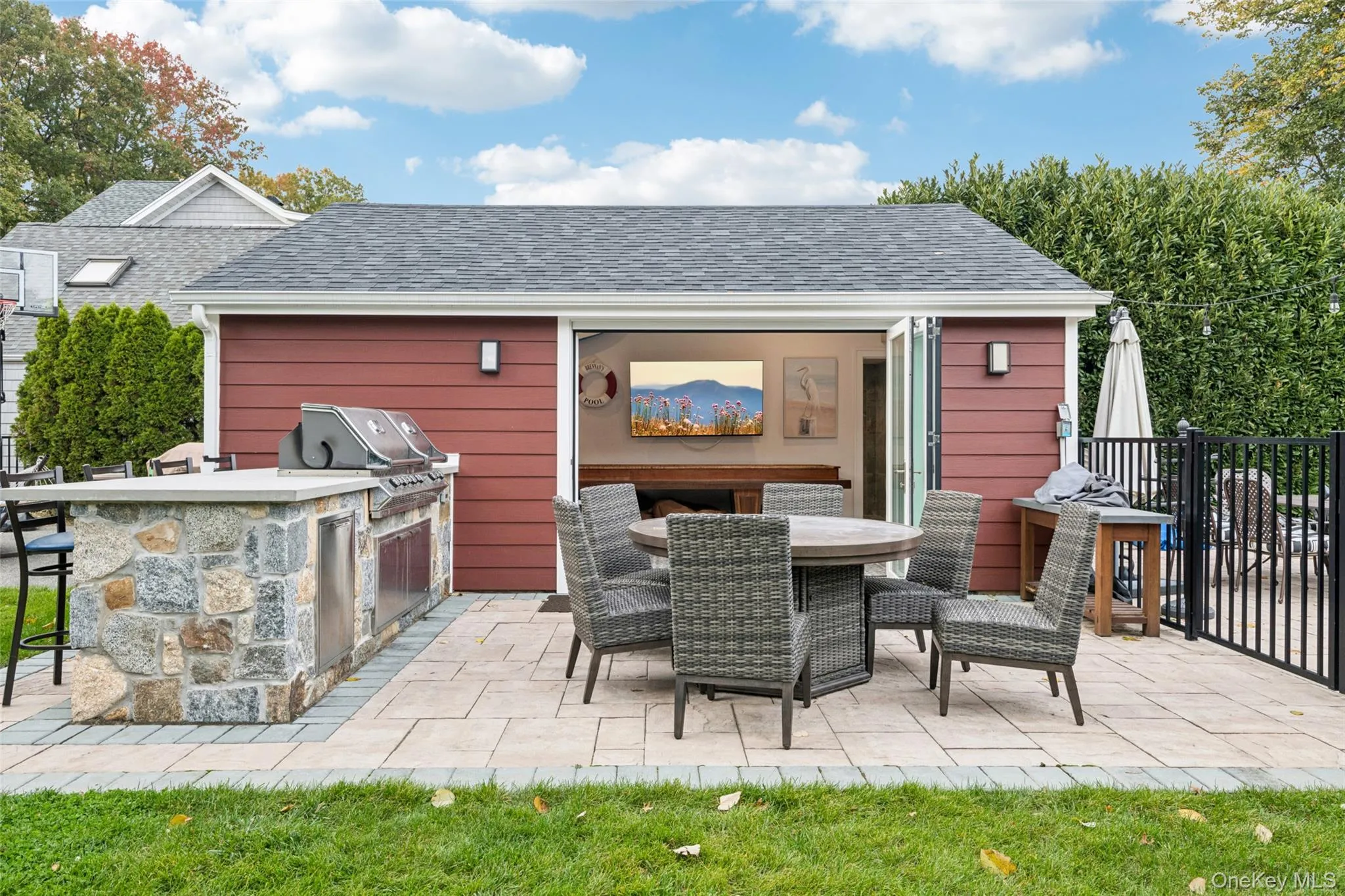 View of patio featuring outdoor dining space and area for grilling View of patio featuring outdoor dining space and area for grilling