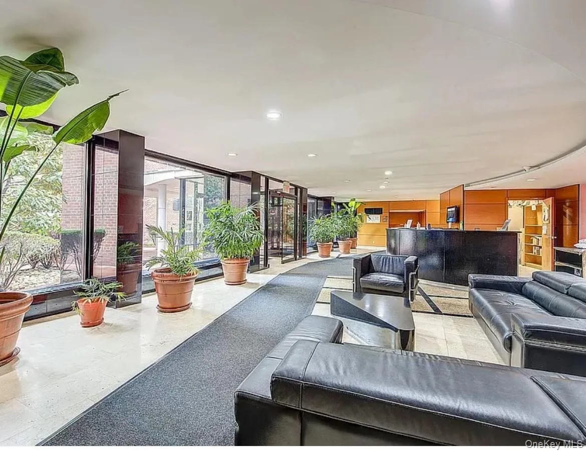 Lobby featuring expansive windows and recessed lighting Lobby featuring expansive windows and recessed lighting