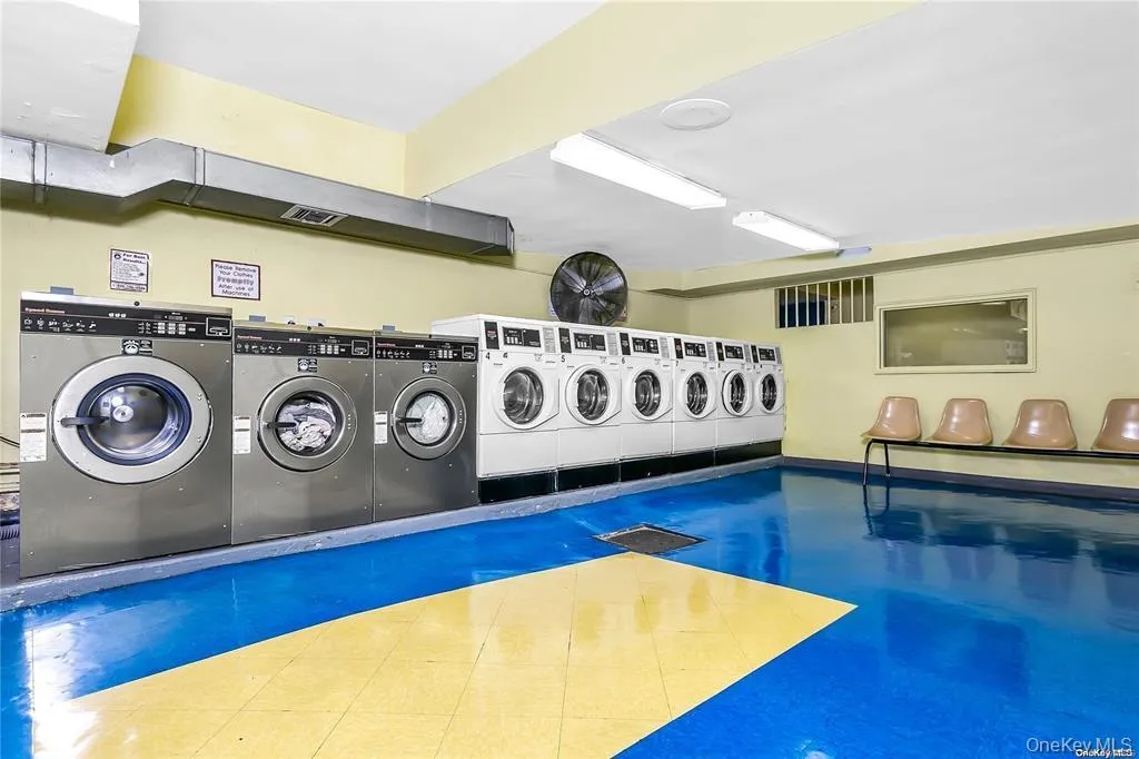 View of swimming pool with washer / clothes dryer View of swimming pool with washer / clothes dryer