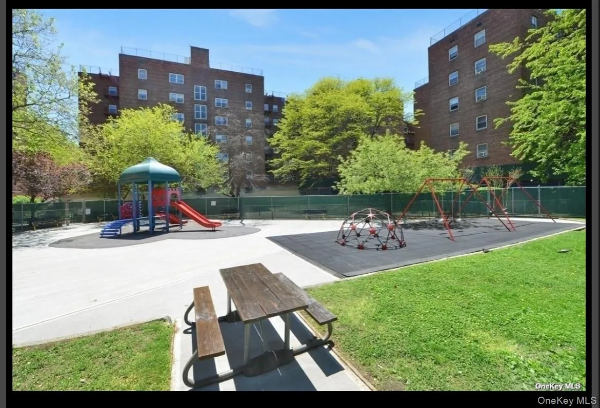 Community playground with a patio Community playground with a patio