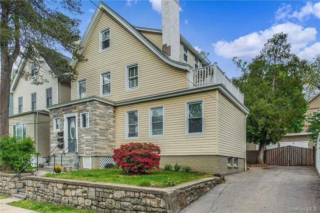 First floor apartment has use of driveway and garage for one car First floor apartment has use of driveway and garage for one car