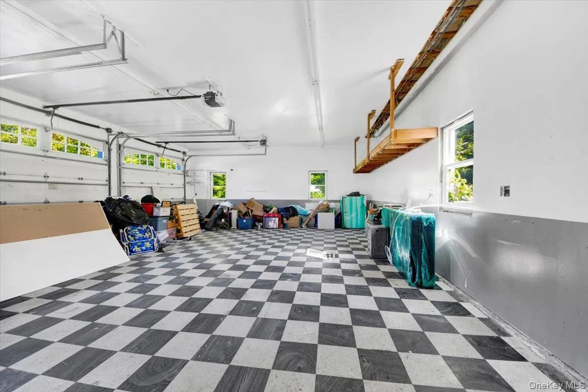Garage with a garage door opener Garage with a garage door opener