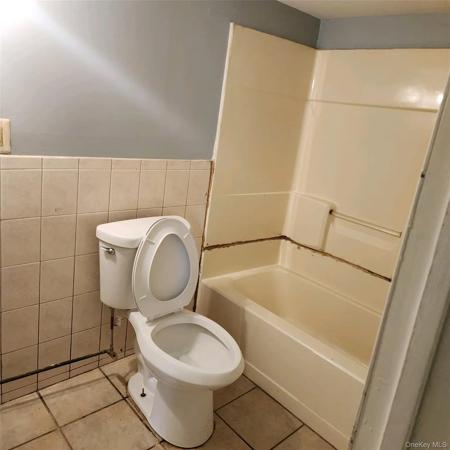 Full bathroom featuring shower / tub combination Full bathroom featuring shower / tub combination