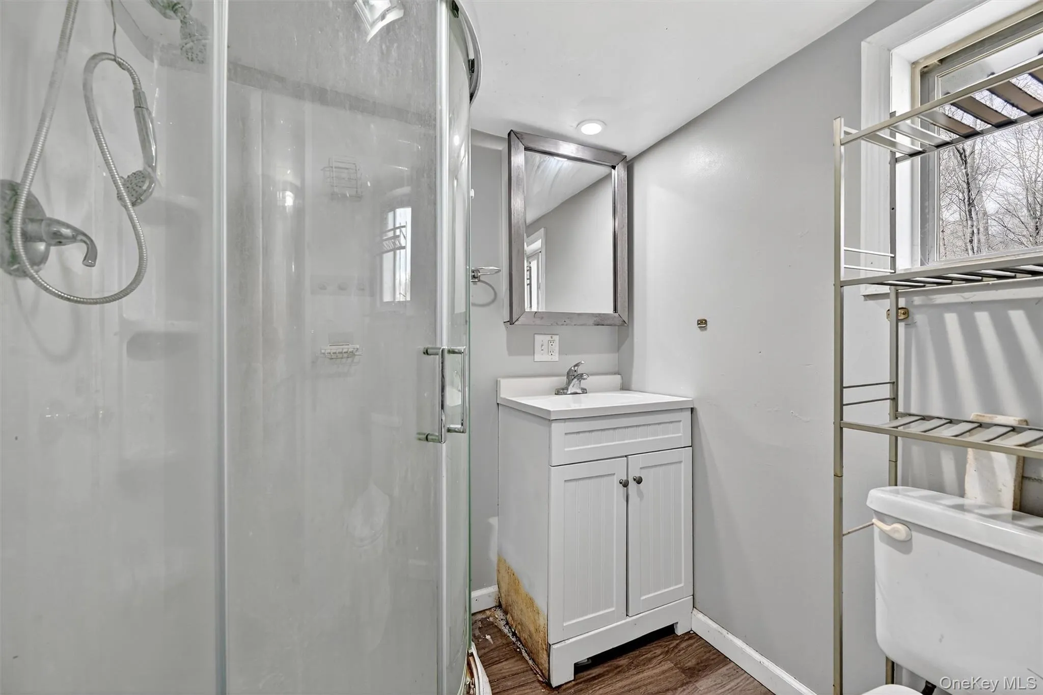Full bathroom with a stall shower Full bathroom with a stall shower