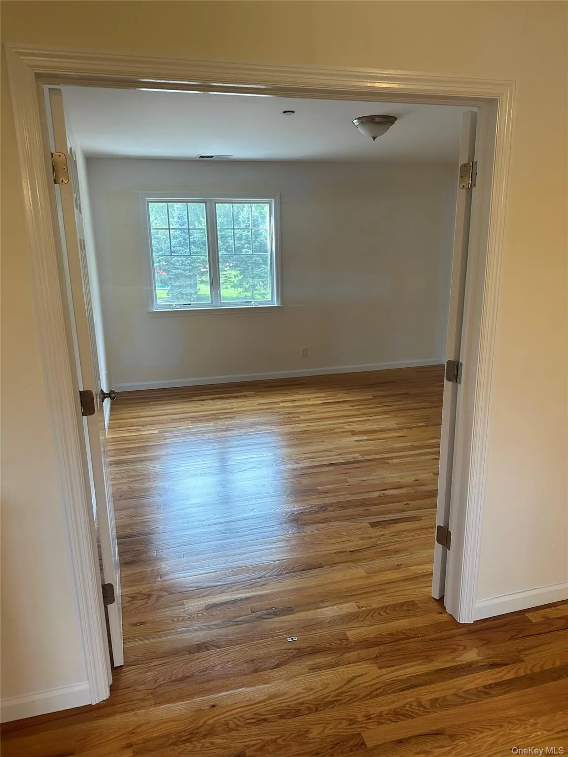 Bedroom featuring hardwood floors. Bedroom featuring hardwood floors.