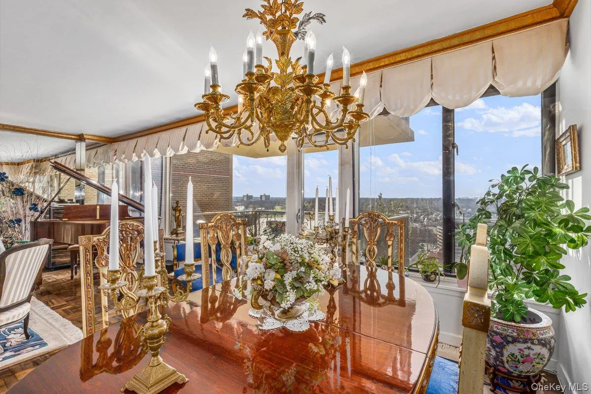 Dining area with healthy amount of natural light and a chandelier Dining area with healthy amount of natural light and a chandelier