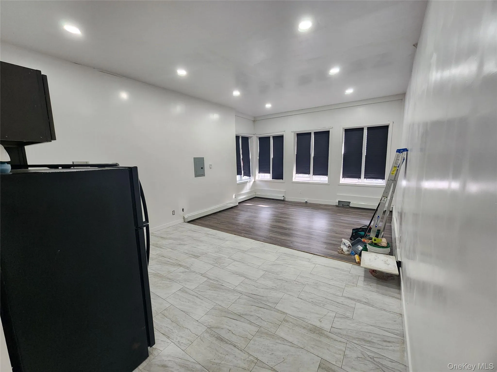 Workout room featuring recessed lighting and electric panel Workout room featuring recessed lighting and electric panel