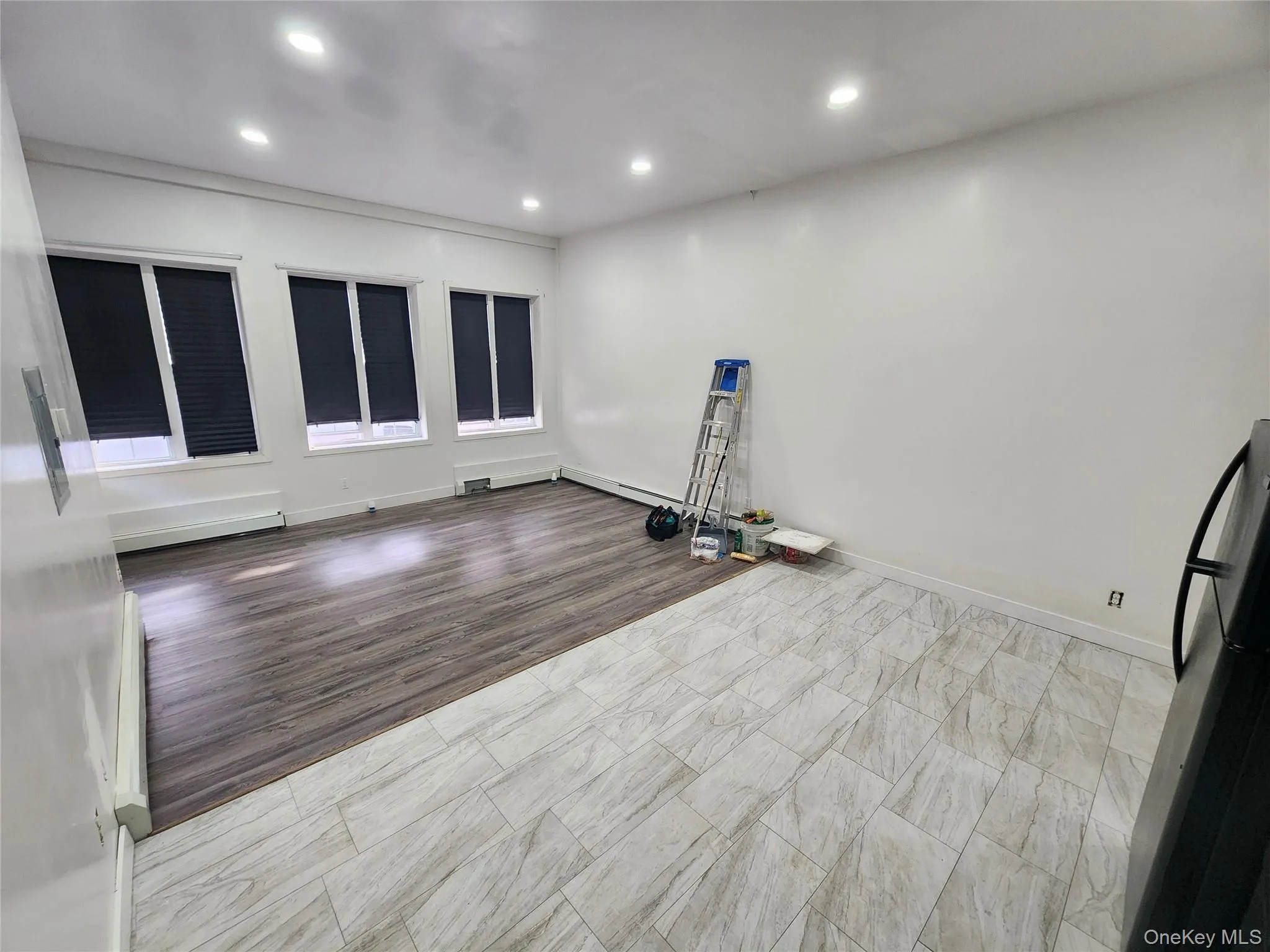 Workout room with recessed lighting and baseboard heating Workout room with recessed lighting and baseboard heating