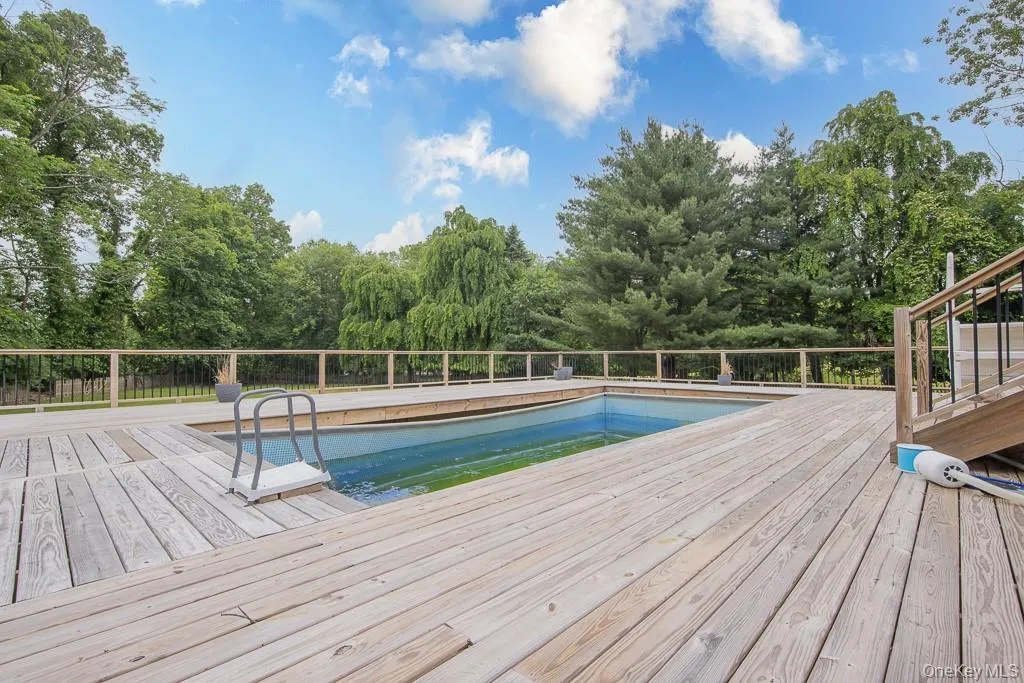 View of swimming pool with a deck View of swimming pool with a deck