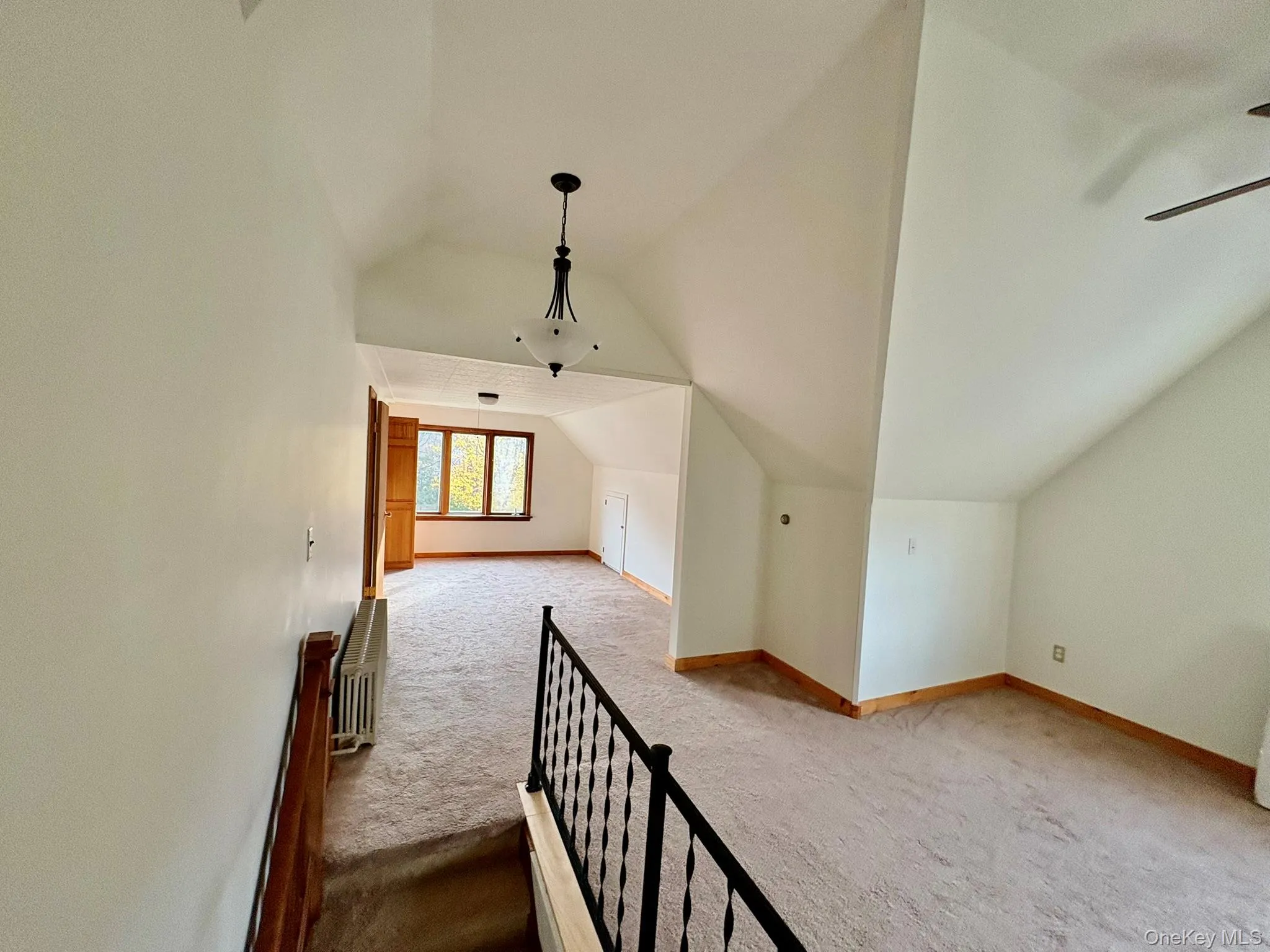 2nd Floor Bonus room with light colored carpet, vaulted ceiling, and ceiling fan 2nd Floor Bonus room with light colored carpet, vaulted ceiling, and ceiling fan