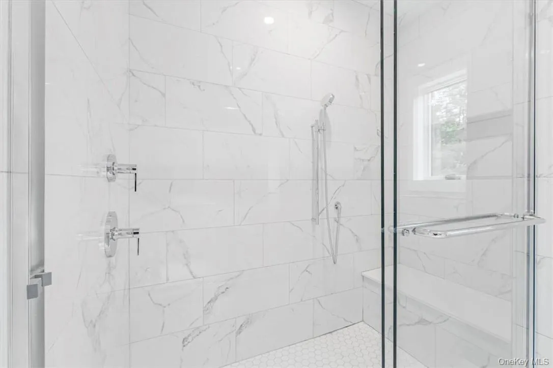 Bathroom with an enclosed shower Bathroom with an enclosed shower