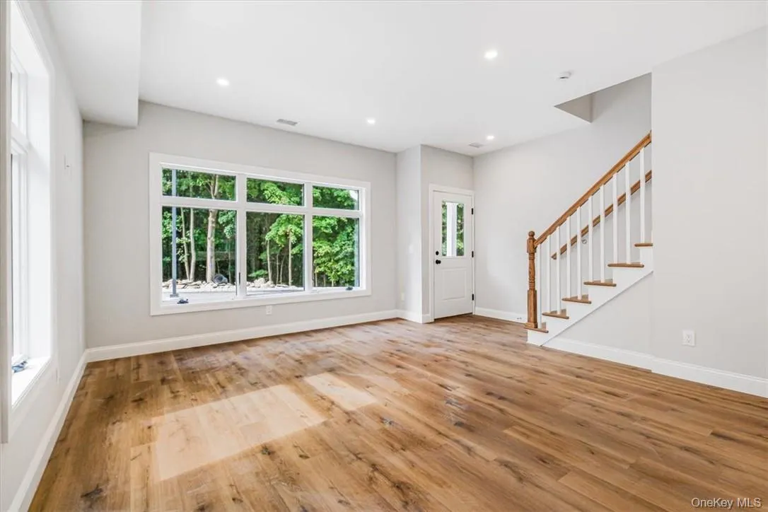Foyer entrance featuring light wood-type flooring Foyer entrance featuring light wood-type flooring