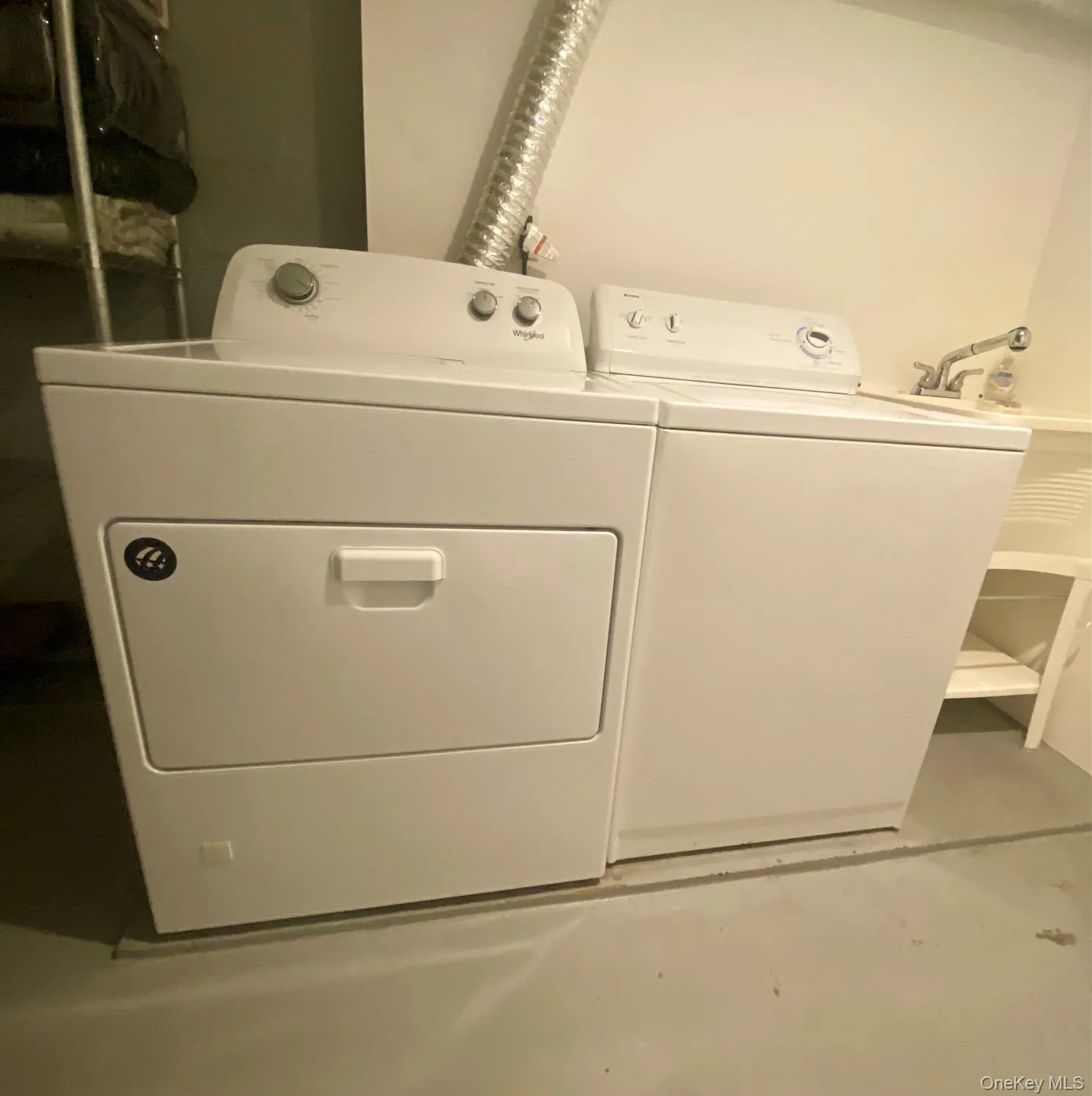 Laundry area featuring washing machine and clothes dryer Laundry area featuring washing machine and clothes dryer