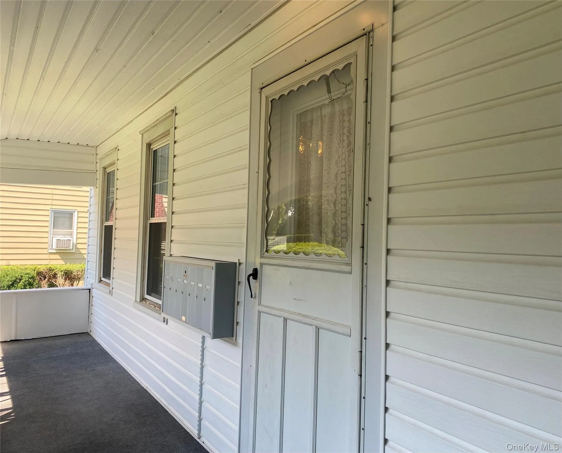 Entrance to property featuring a porch Entrance to property featuring a porch