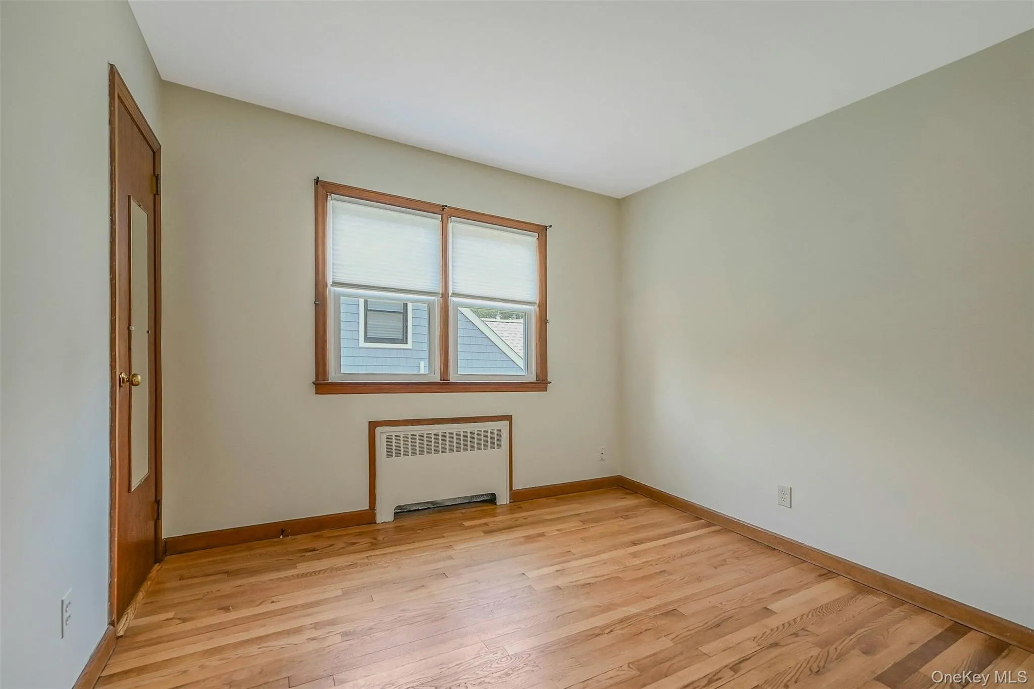 Upstairs Bedroom w/ Hardwood Floors Upstairs Bedroom w/ Hardwood Floors