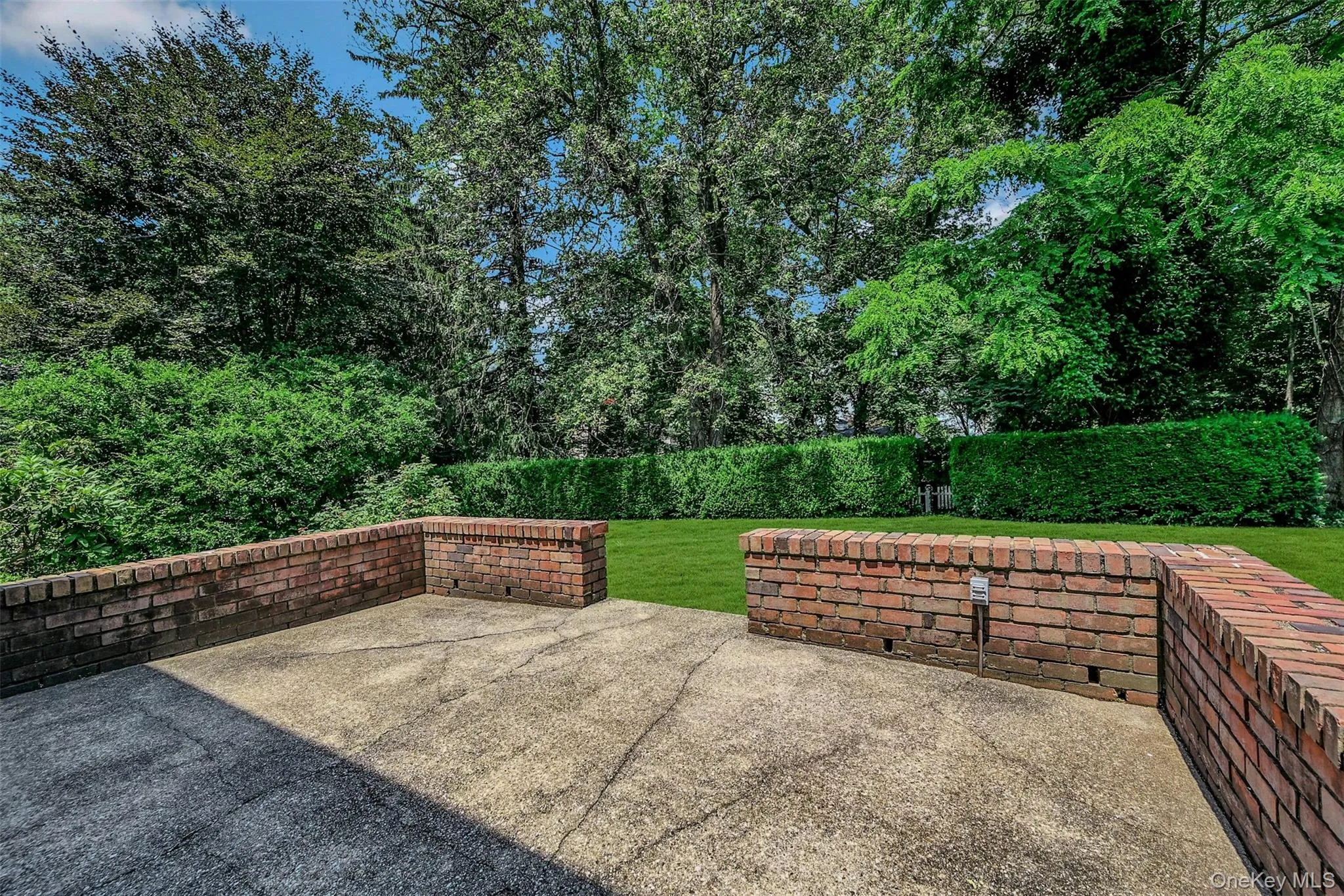 Private Backyard Extends Beyond Back Hedges Private Backyard Extends Beyond Back Hedges