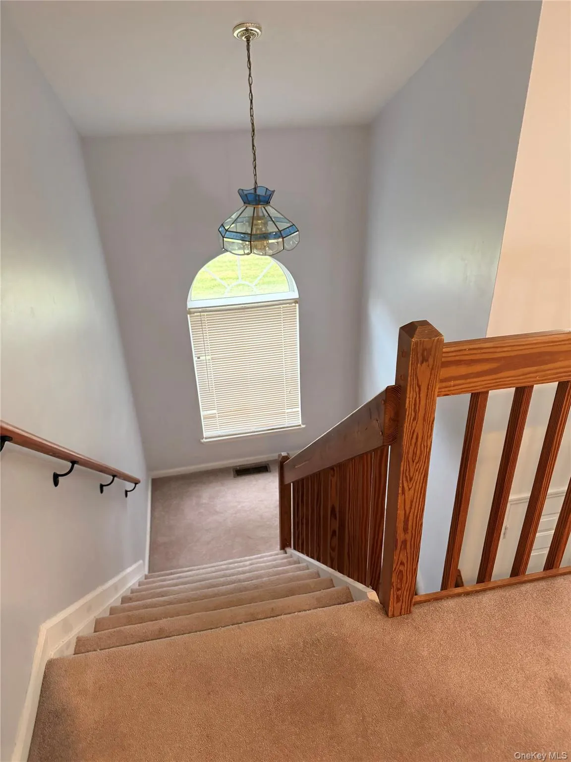 Stairway with carpet floors and baseboards Stairway with carpet floors and baseboards