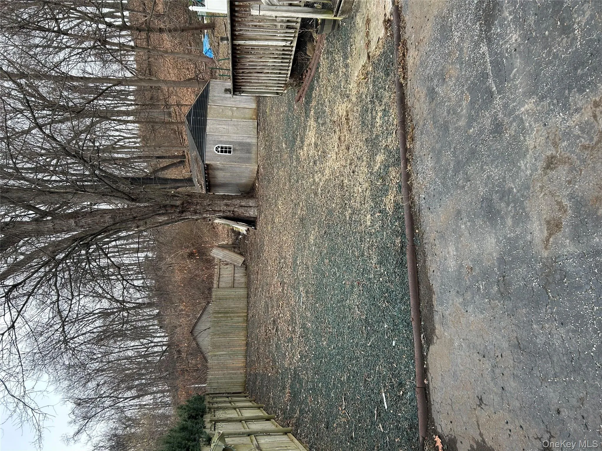 Fenced backyard featuring a shed Fenced backyard featuring a shed