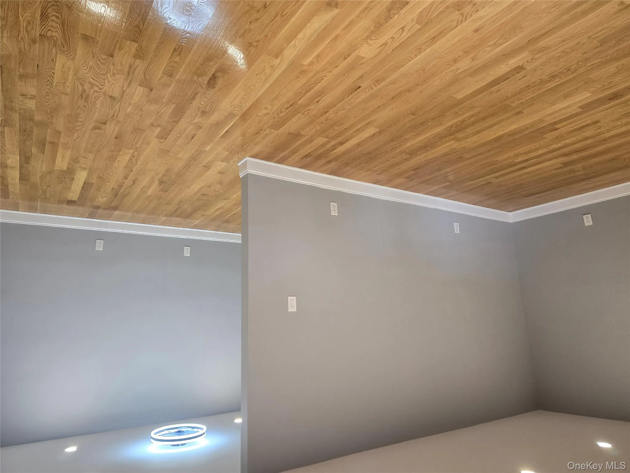 Empty room featuring recessed lighting and light wood-style flooring Empty room featuring recessed lighting and light wood-style flooring