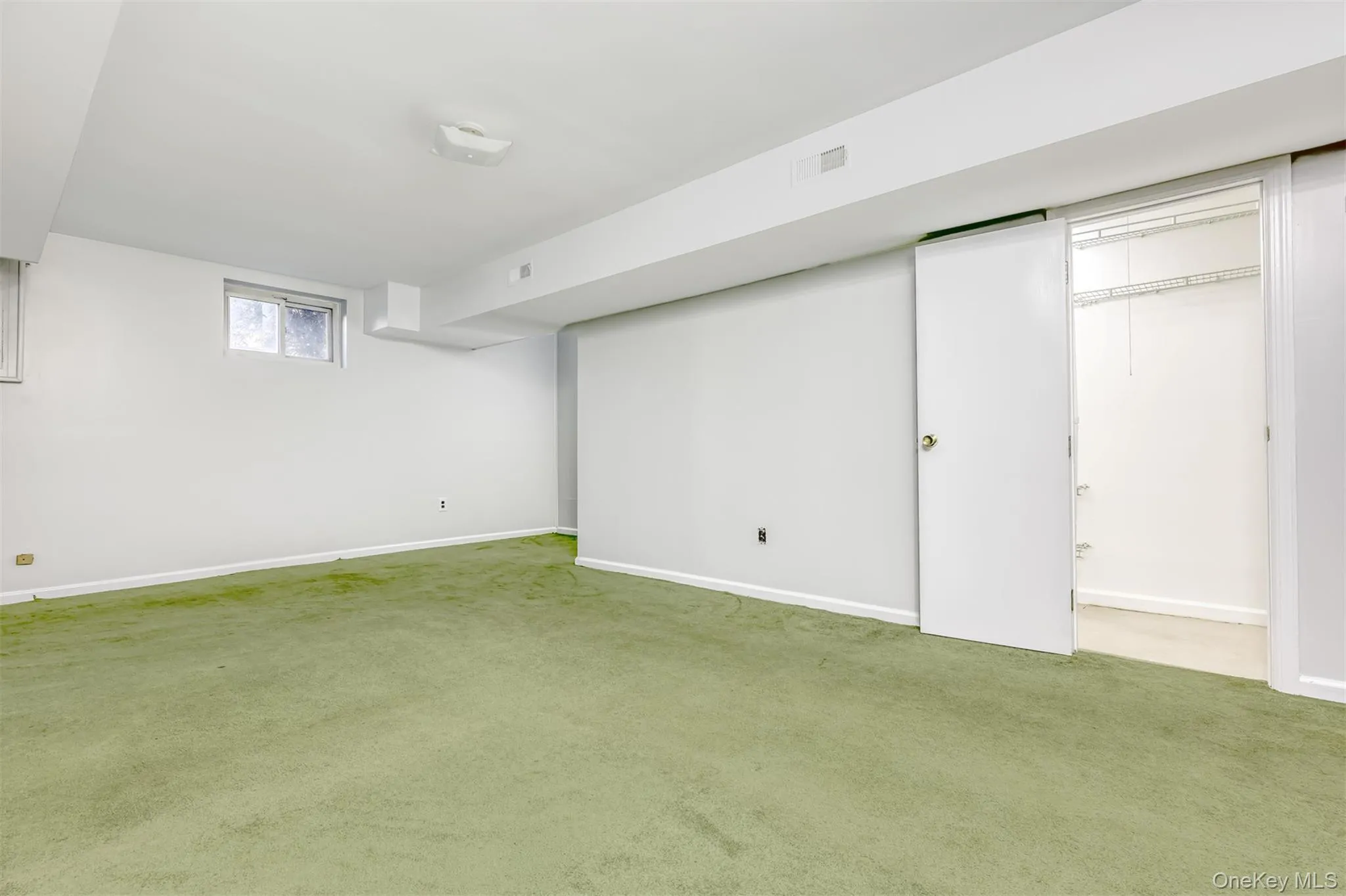 Basement with closet and Half Bathroom Basement with closet and Half Bathroom