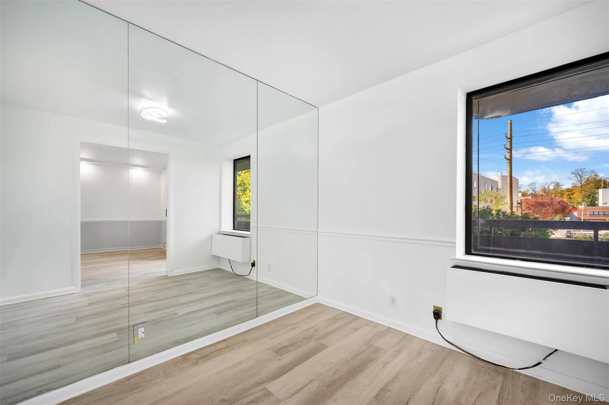 Bedroom featuring light wood Bedroom featuring light wood