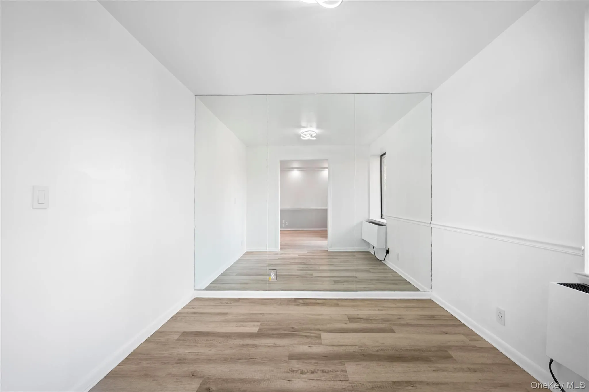 Bedroom featuring light Wood Floors Bedroom featuring light Wood Floors