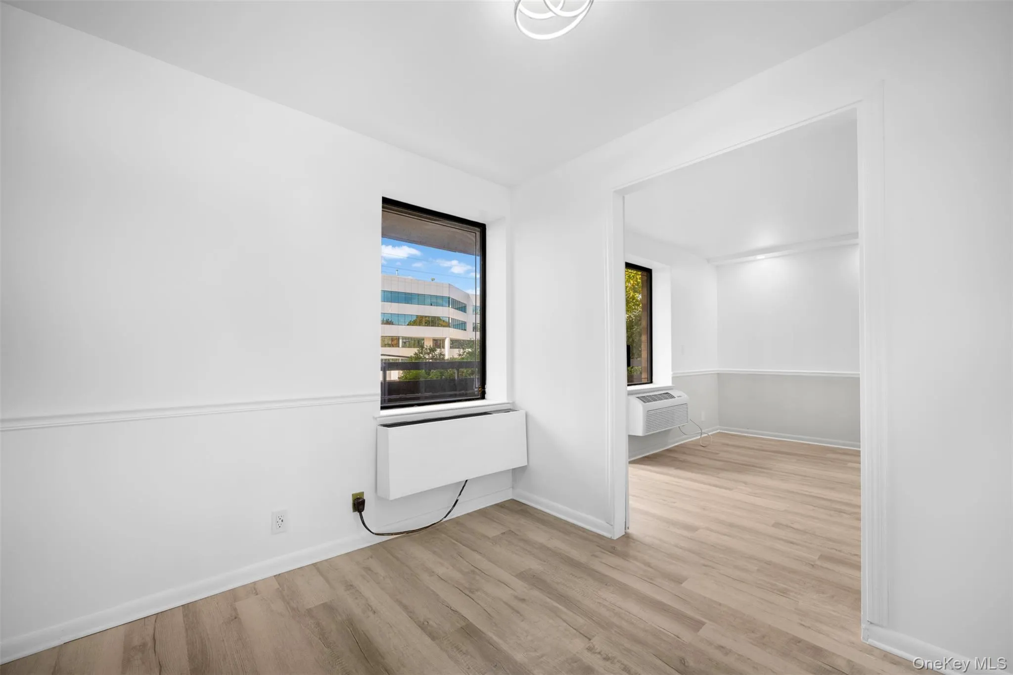 Bedroom featuring light wood Bedroom featuring light wood