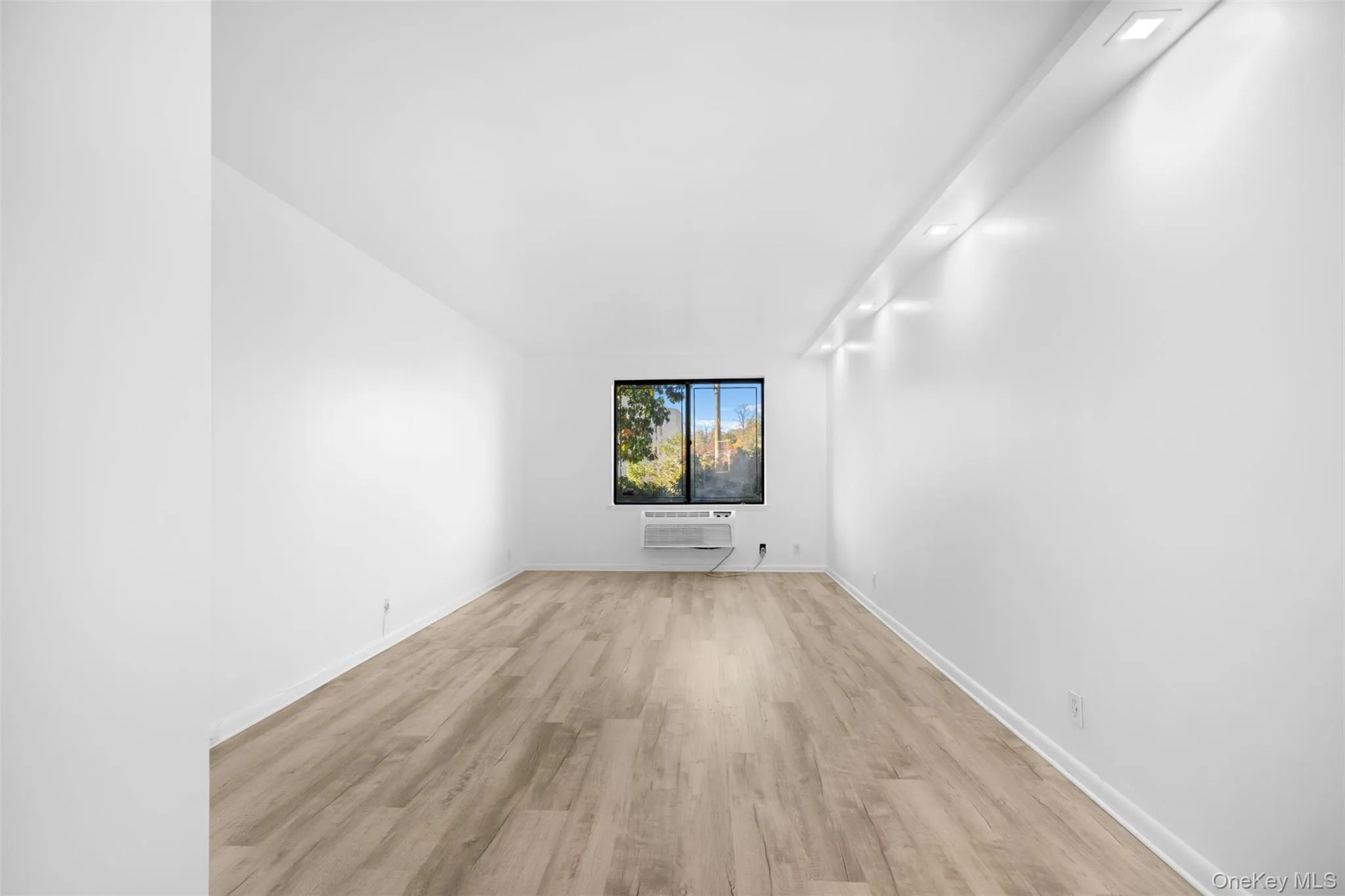 Primary Bedroom featuring light wood-style flooring Primary Bedroom featuring light wood-style flooring