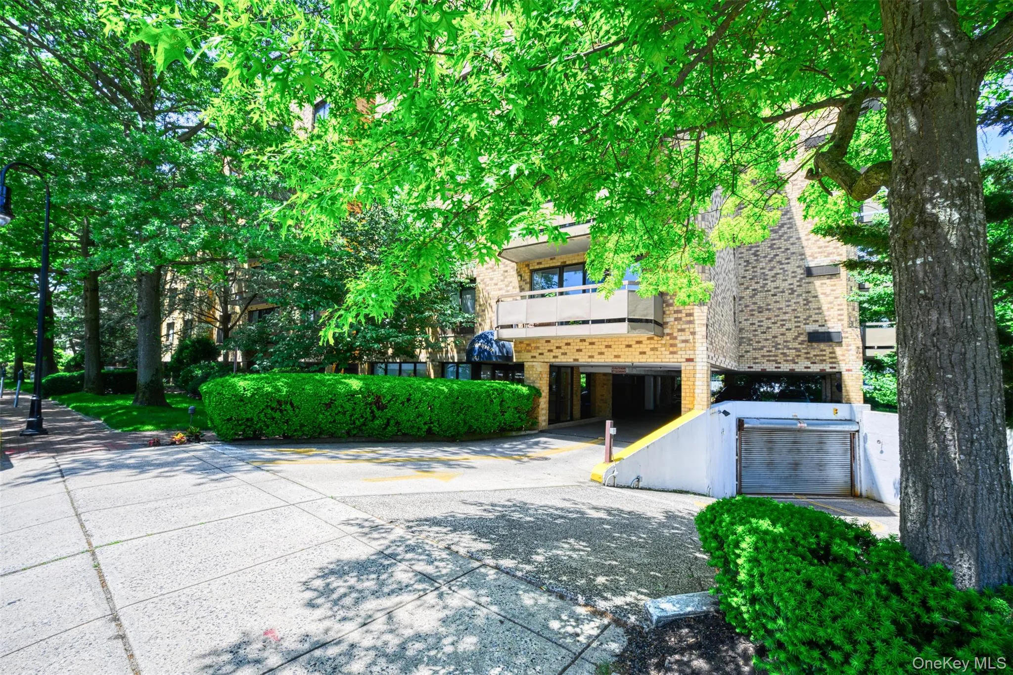 Building with Views of upper and indoor garages Building with Views of upper and indoor garages