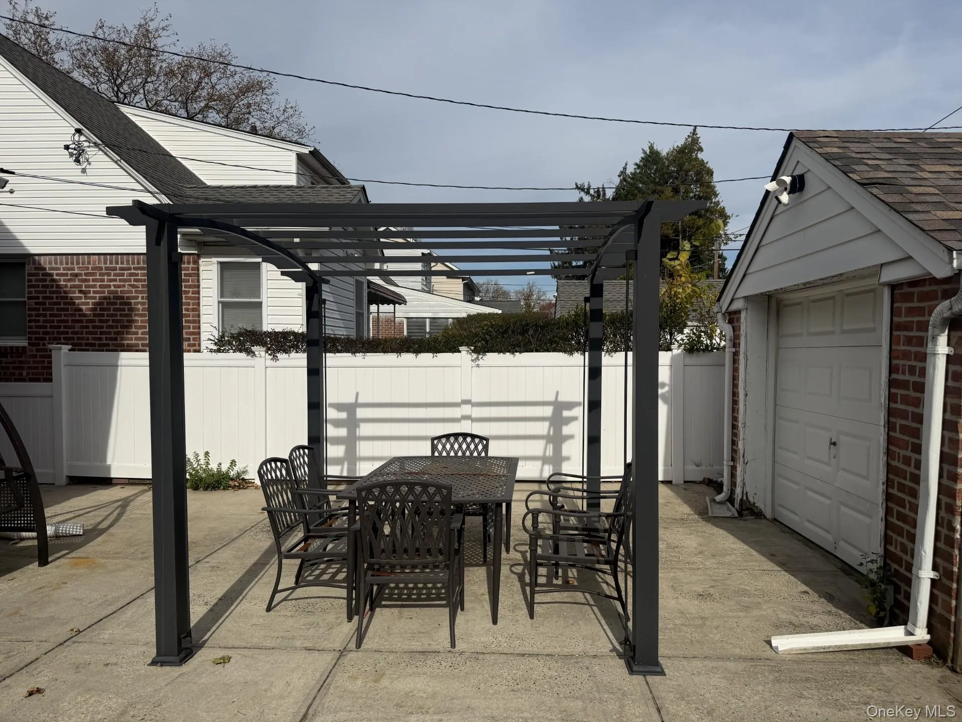 View of patio / terrace with outdoor dining space and a pergola View of patio / terrace with outdoor dining space and a pergola