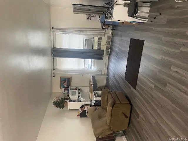 Living area featuring dark wood-type flooring Living area featuring dark wood-type flooring