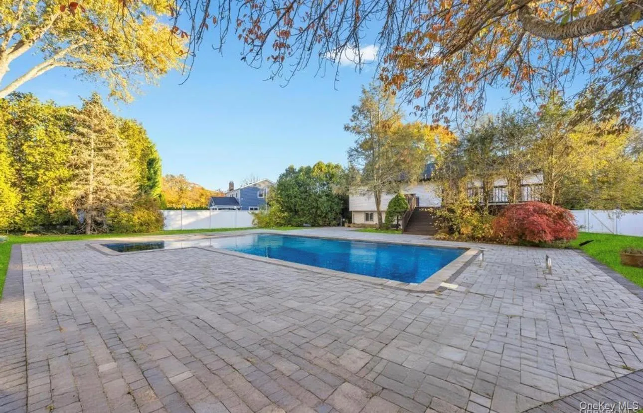 View of pool featuring a fenced backyard and a patio View of pool featuring a fenced backyard and a patio