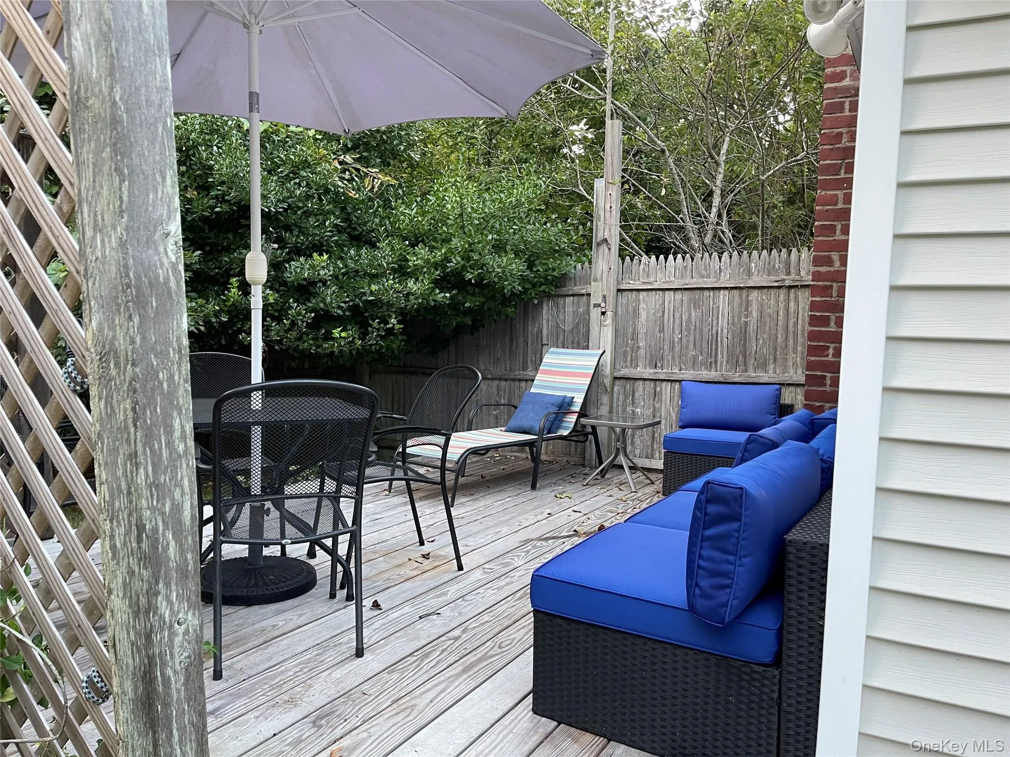 Deck featuring outdoor lounge area and outdoor dining area Deck featuring outdoor lounge area and outdoor dining area