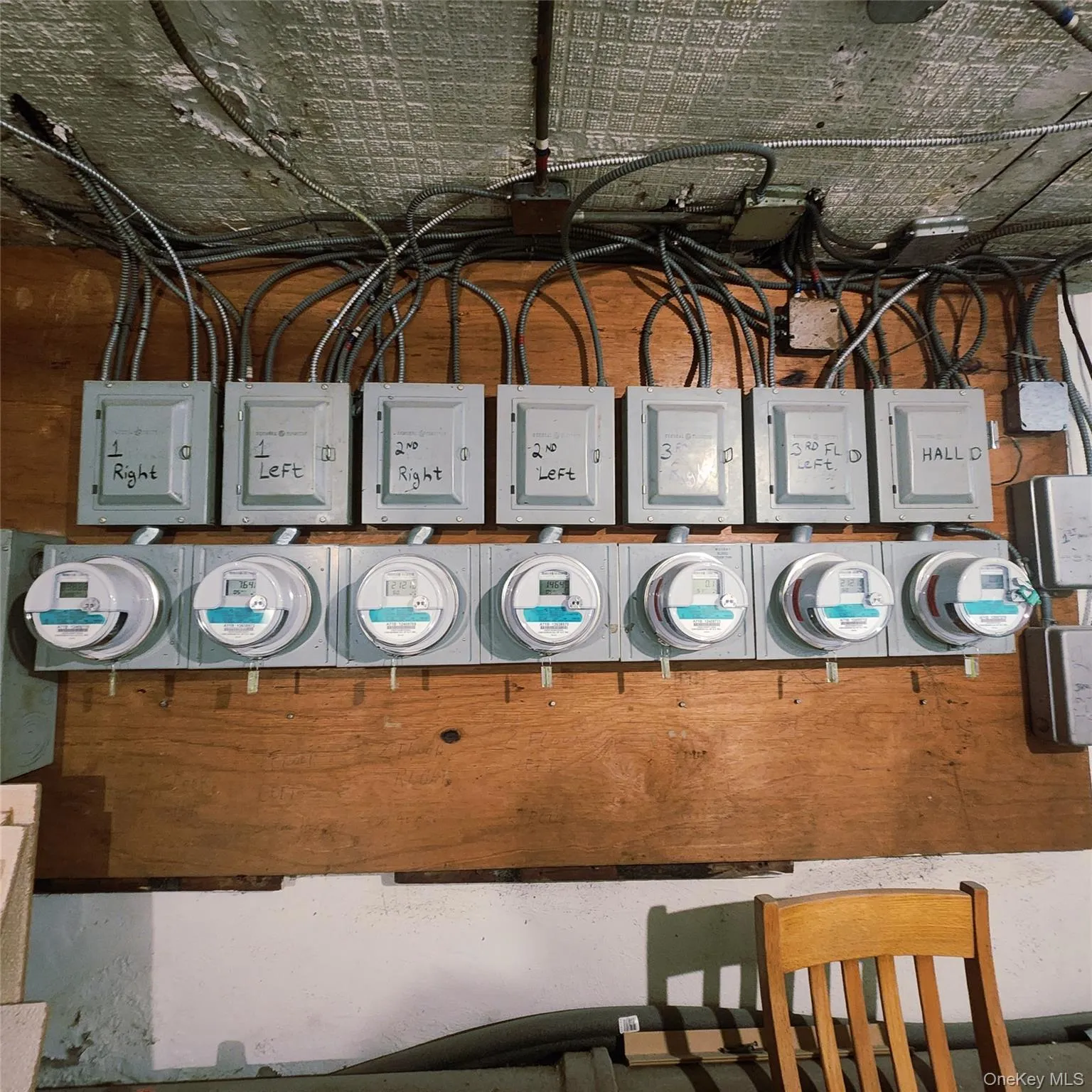 Utility room featuring electric panel Utility room featuring electric panel