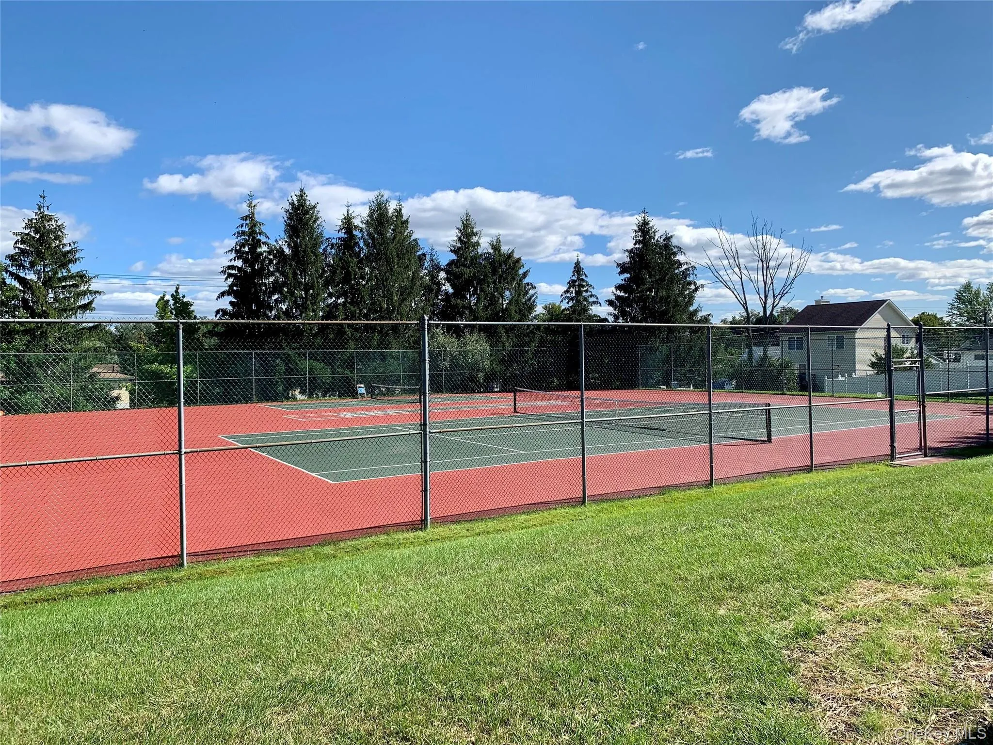 View of tennis court View of tennis court