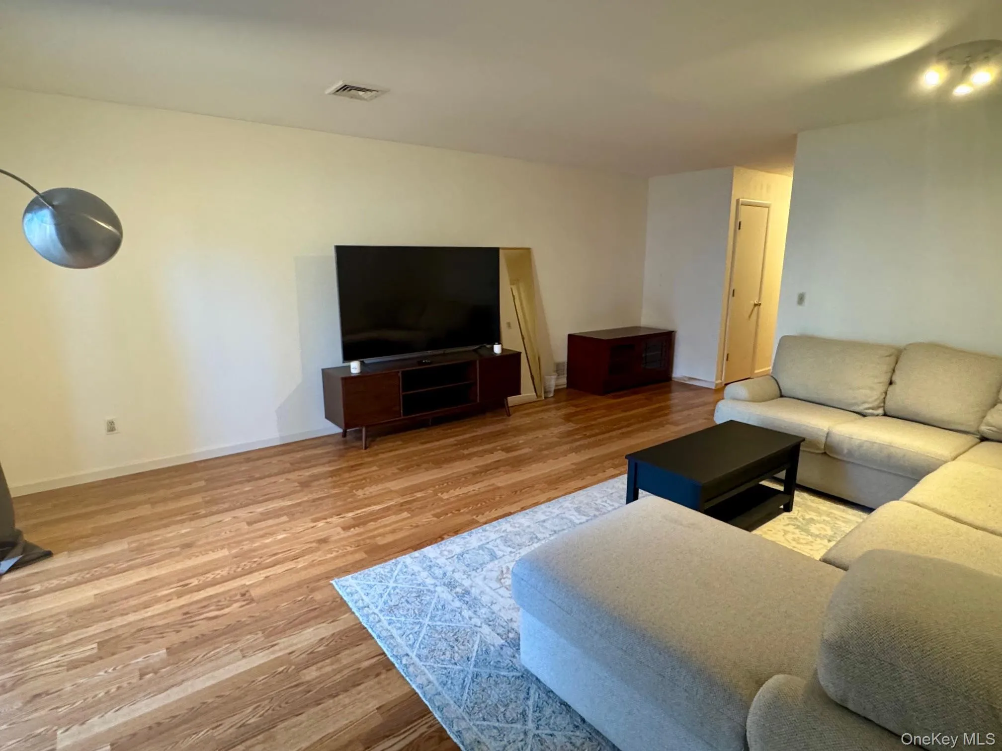 Living area featuring light wood-style flooring Living area featuring light wood-style flooring