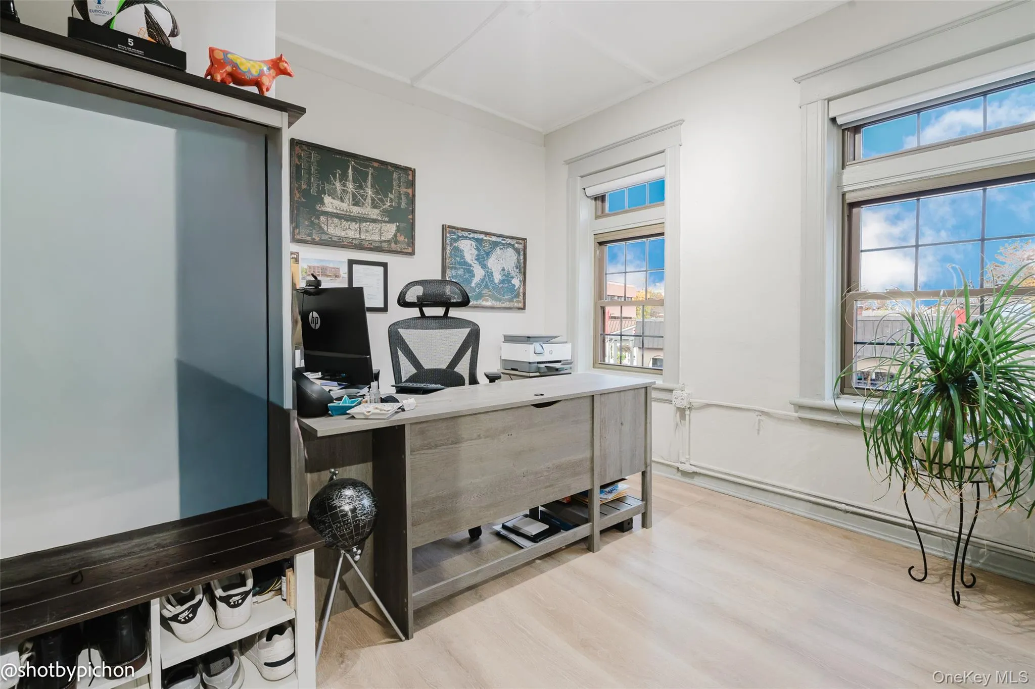 Bonus Room featuring light wood-style flooring Bonus Room featuring light wood-style flooring