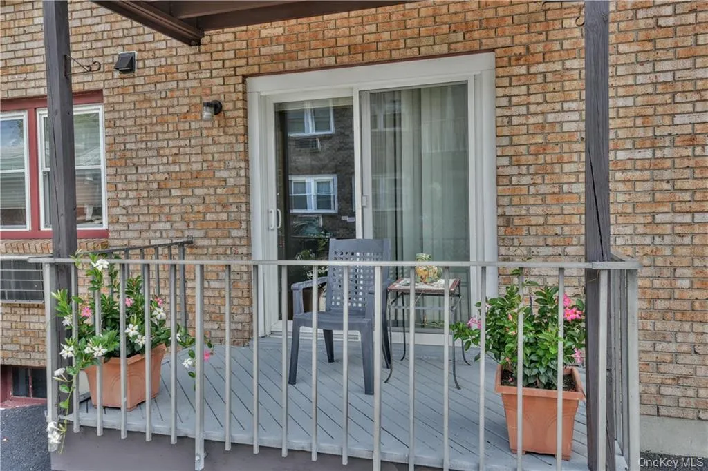 View of exterior entry featuring brick siding View of exterior entry featuring brick siding