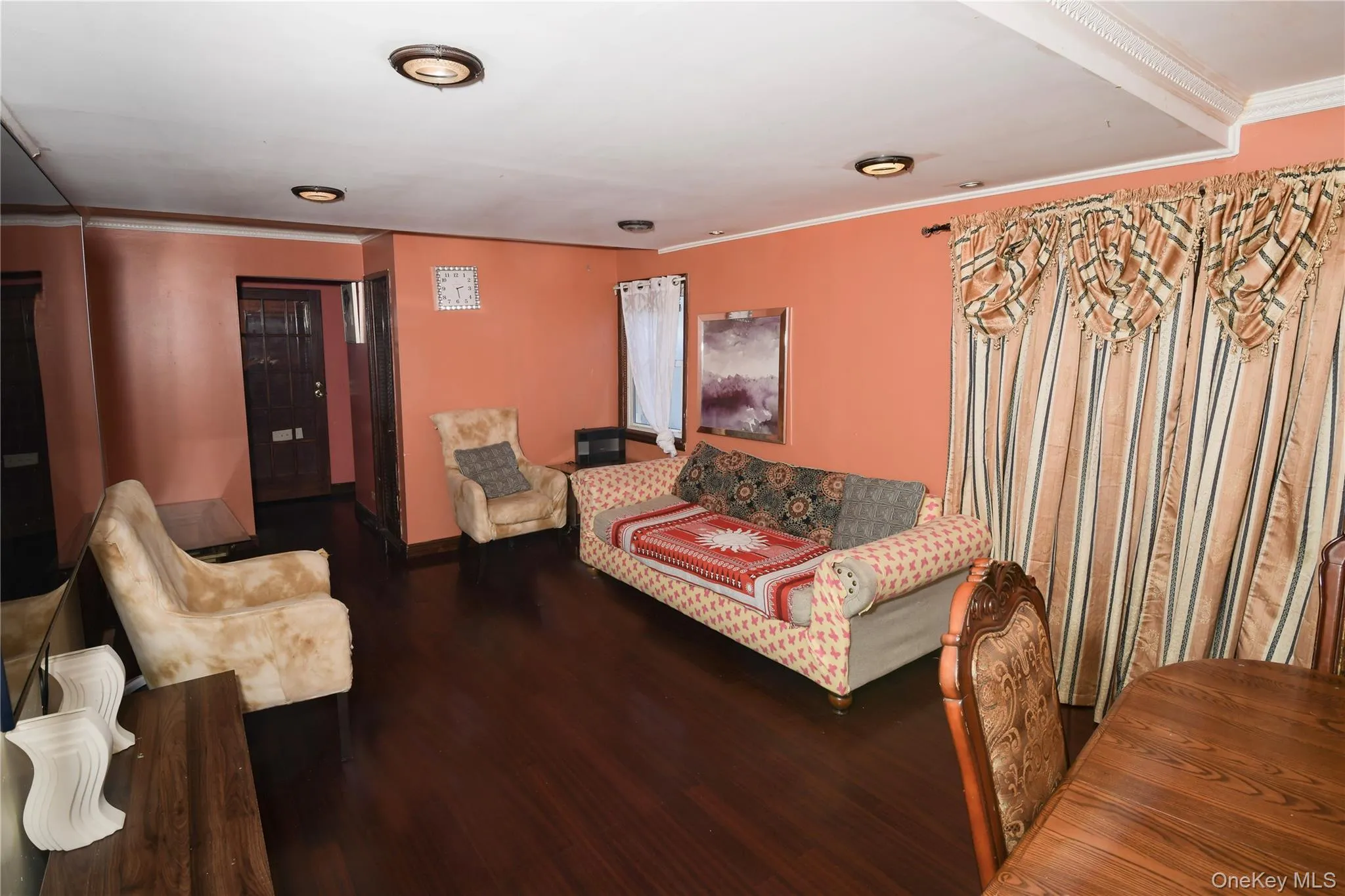 Sitting room featuring ornamental molding Sitting room featuring ornamental molding