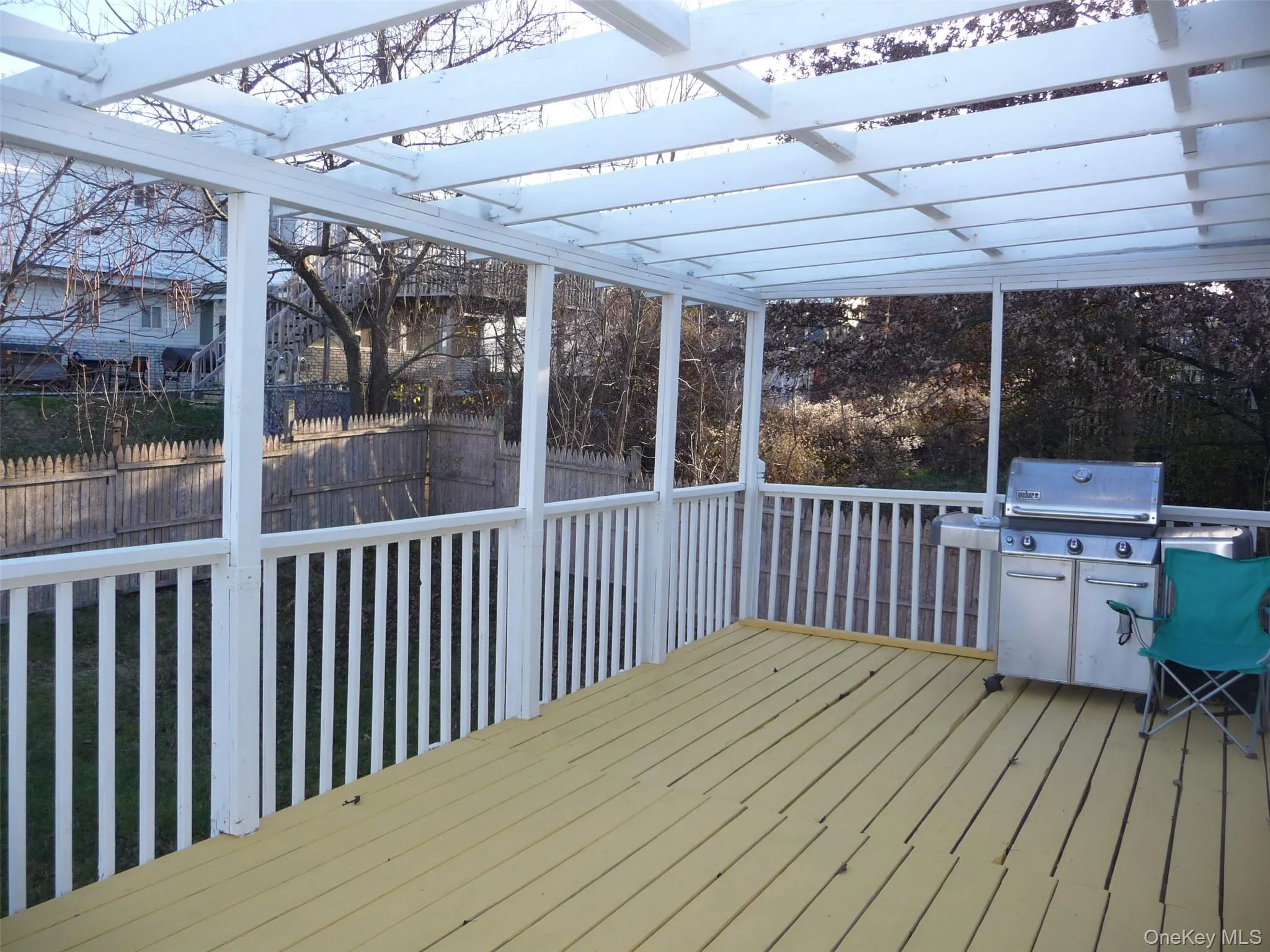 Deck with a grill Deck with a grill