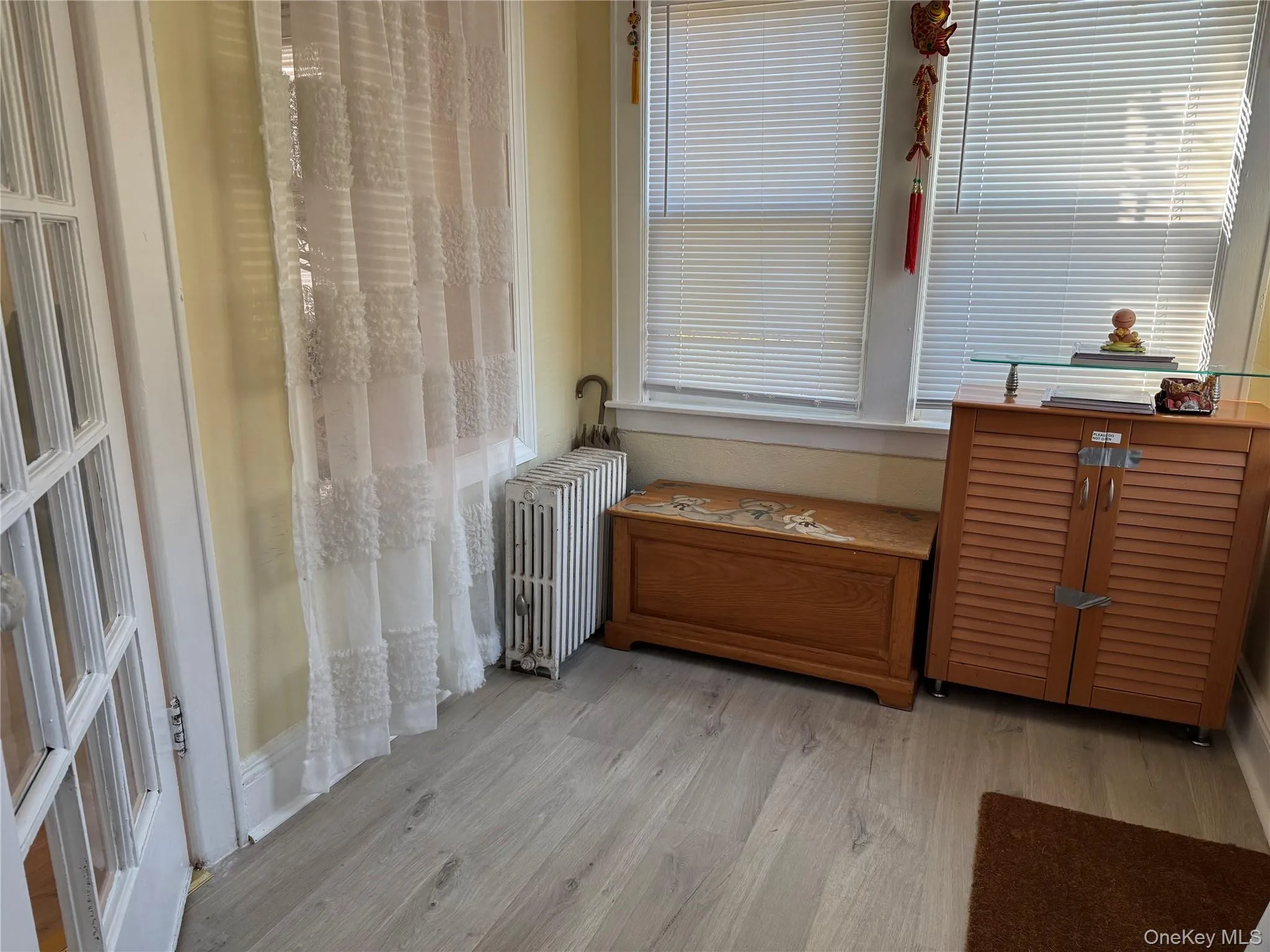 Living area featuring light wood finished floors Living area featuring light wood finished floors