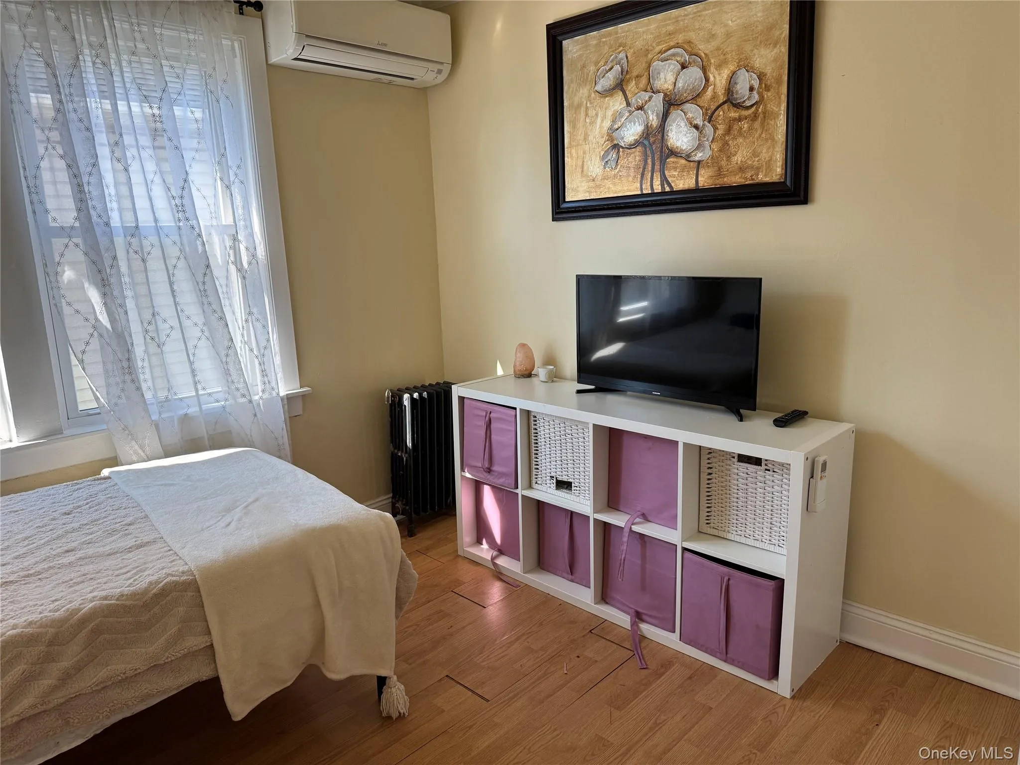 Bedroom with light wood-style floors Bedroom with light wood-style floors
