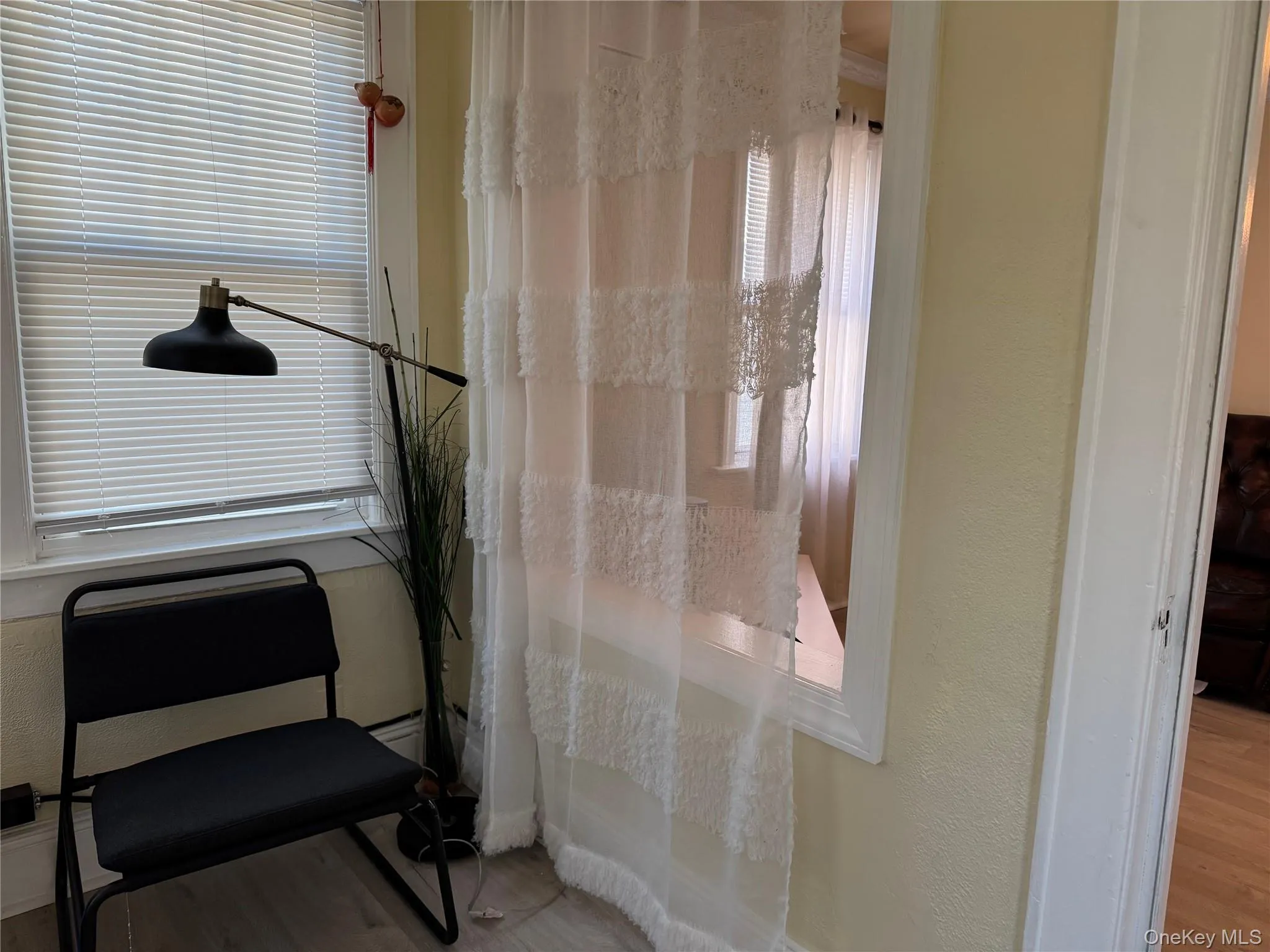 Enclosed entry with wood finished floors Enclosed entry with wood finished floors