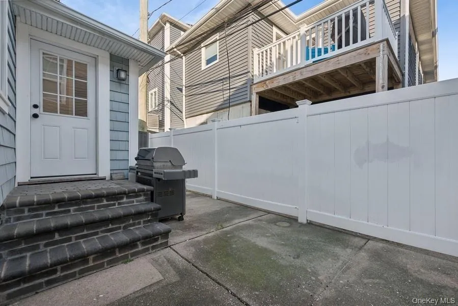 View of patio featuring grilling area View of patio featuring grilling area